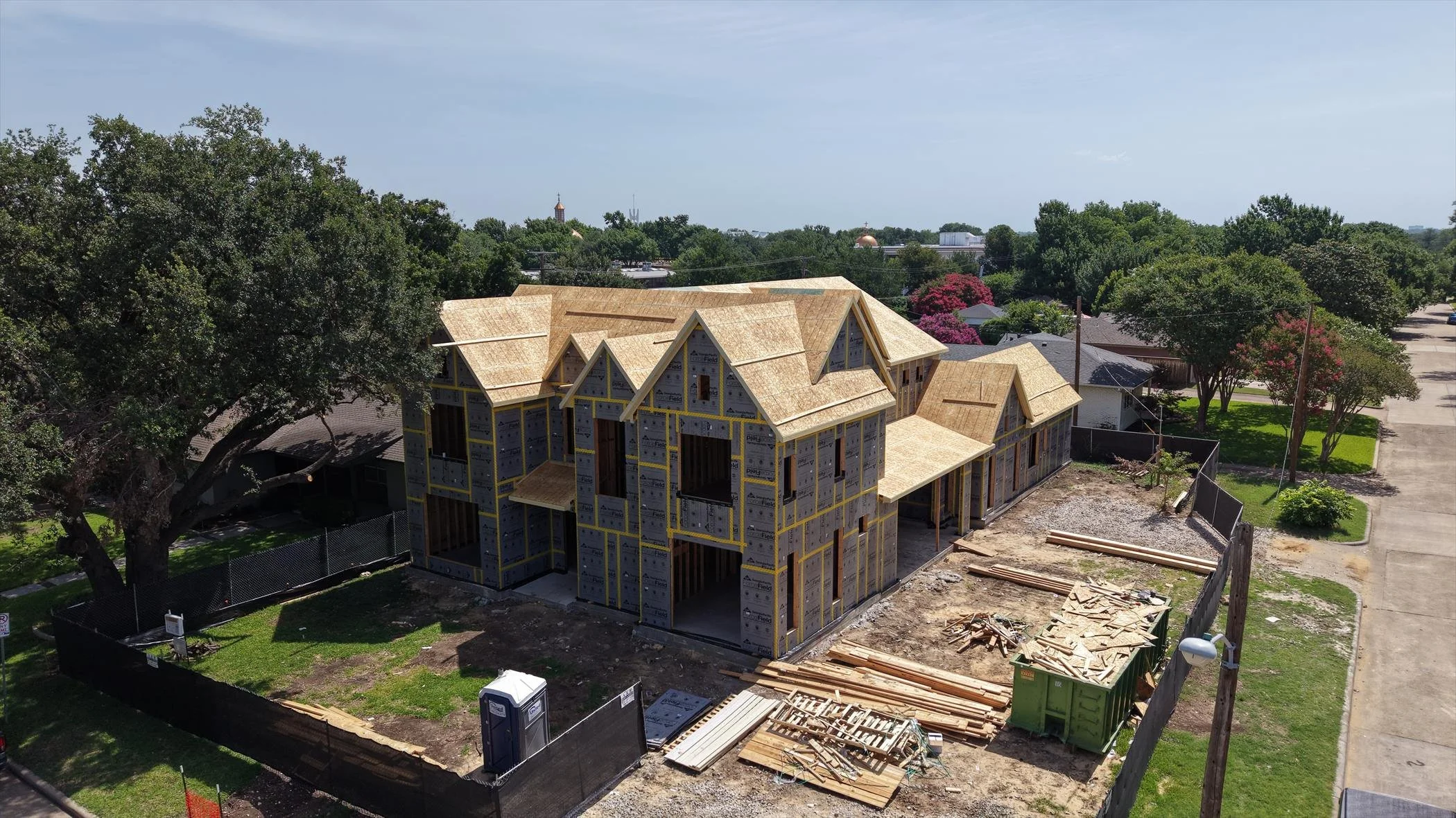 Aerial roof sheathing progress at 9904 Ontario Ln.