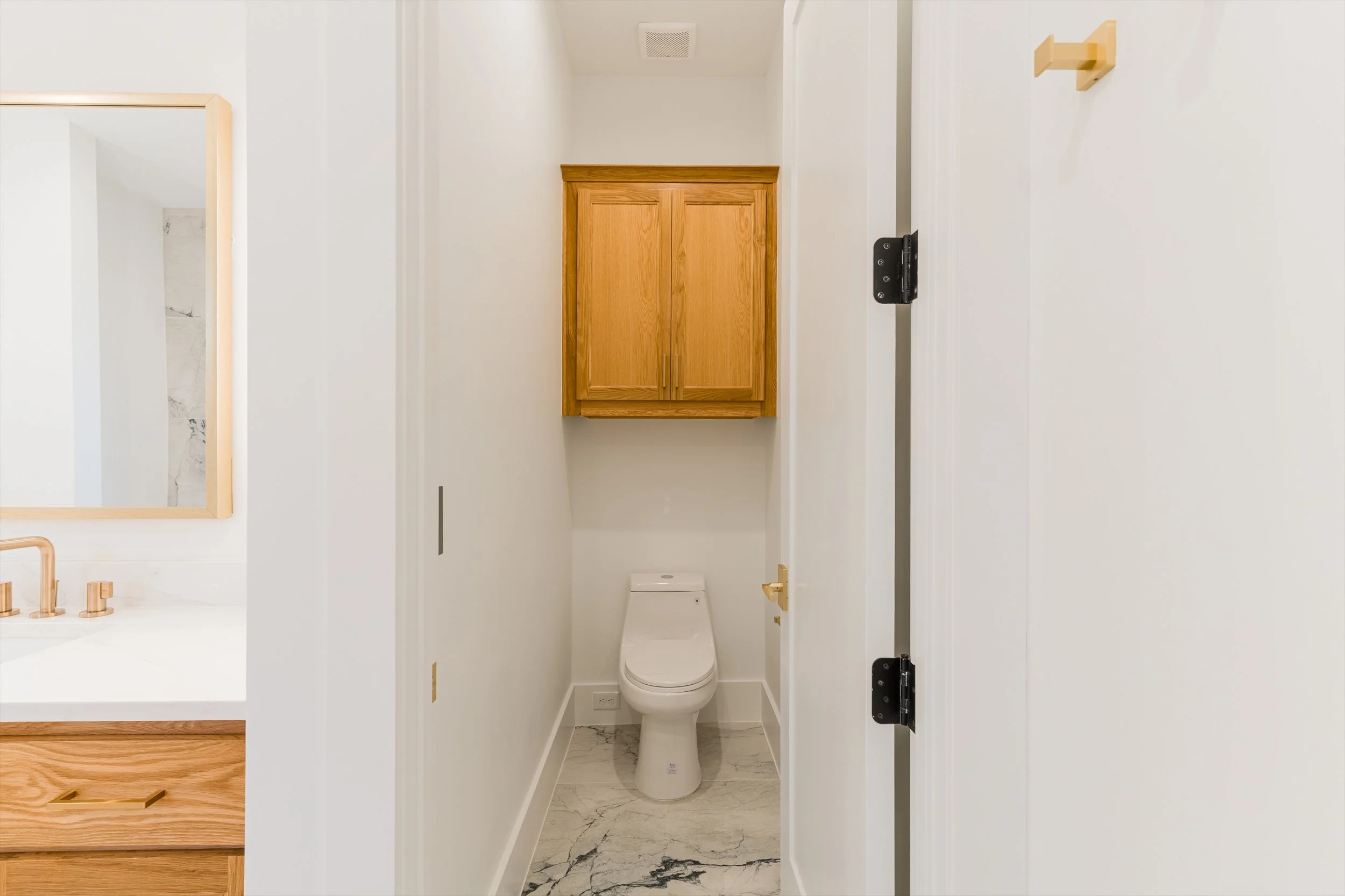 Private water closet at 13510 Crestmoor Dr.
