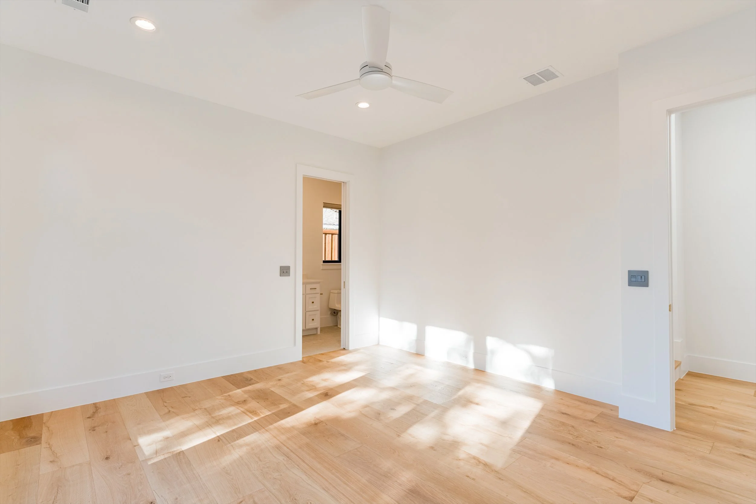Sunlit bedroom at 13510 Crestmoor Dr.