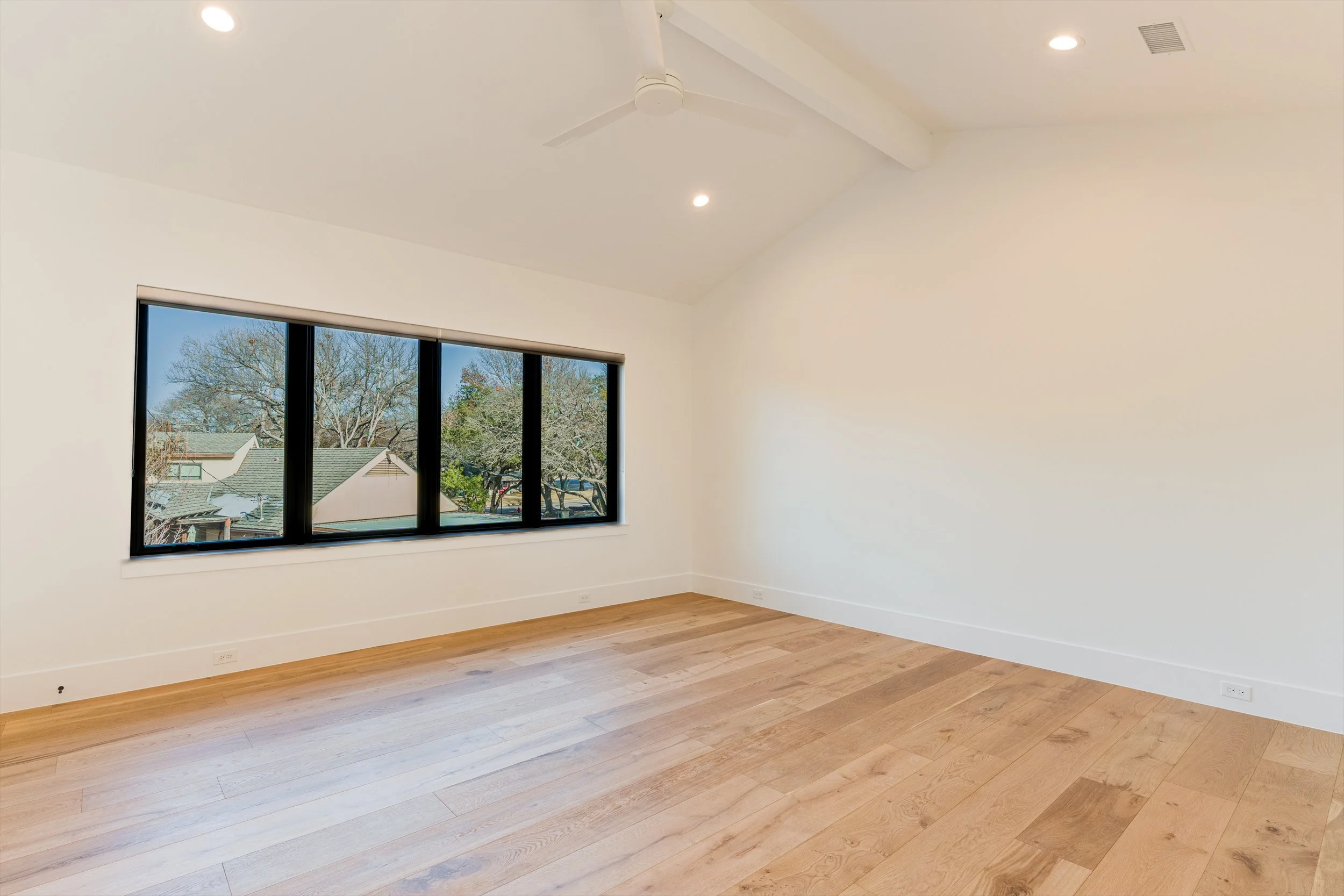 Vaulted bedroom at 13510 Crestmoor Dr.