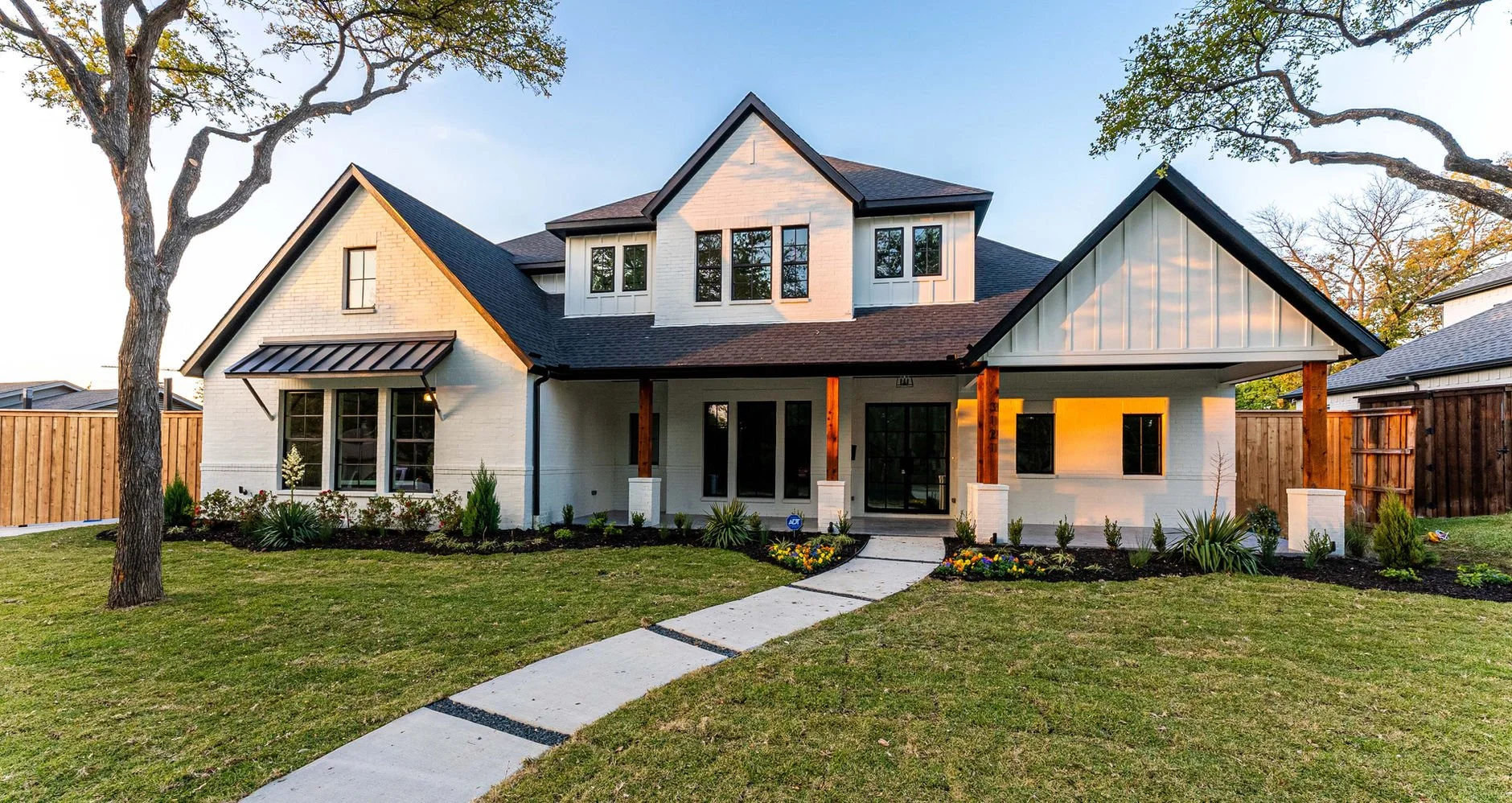 Front exterior of 3121 Pebble Beach Dr custom home in Farmers Branch, Texas