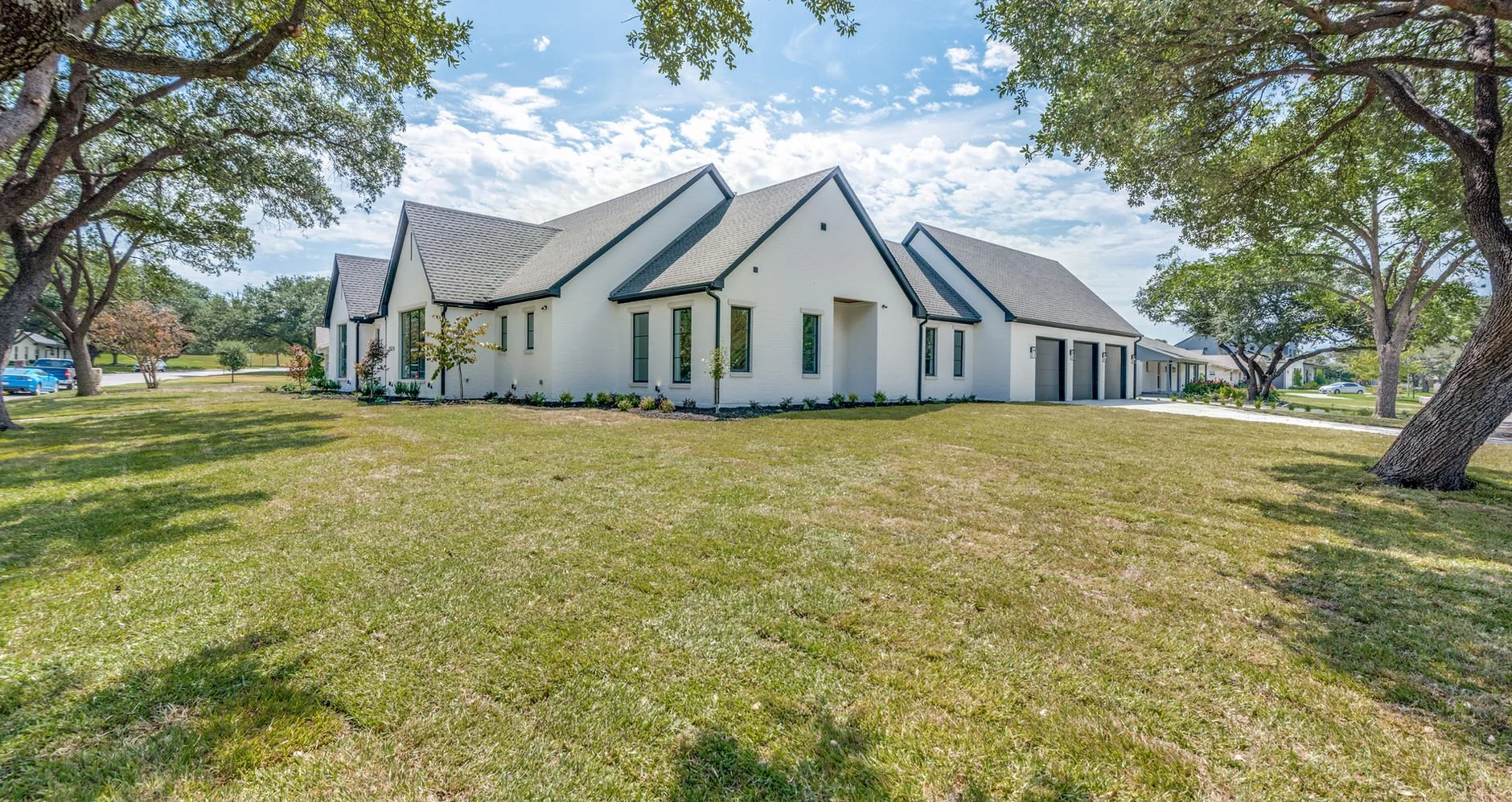 Front exterior of 3510 Pebble Beach Dr custom home in Farmers Branch, Texas