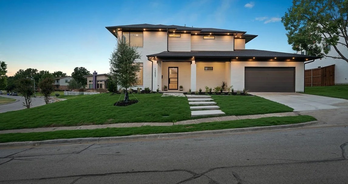 Front exterior of 13807 Lillard Ln custom home near Rawhide Park in Farmers Branch, Texas