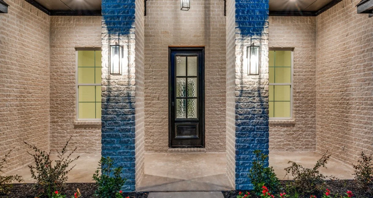 Stone-and-brick entry detail at 3001 Primrose Ln custom home in Farmers Branch, Texas