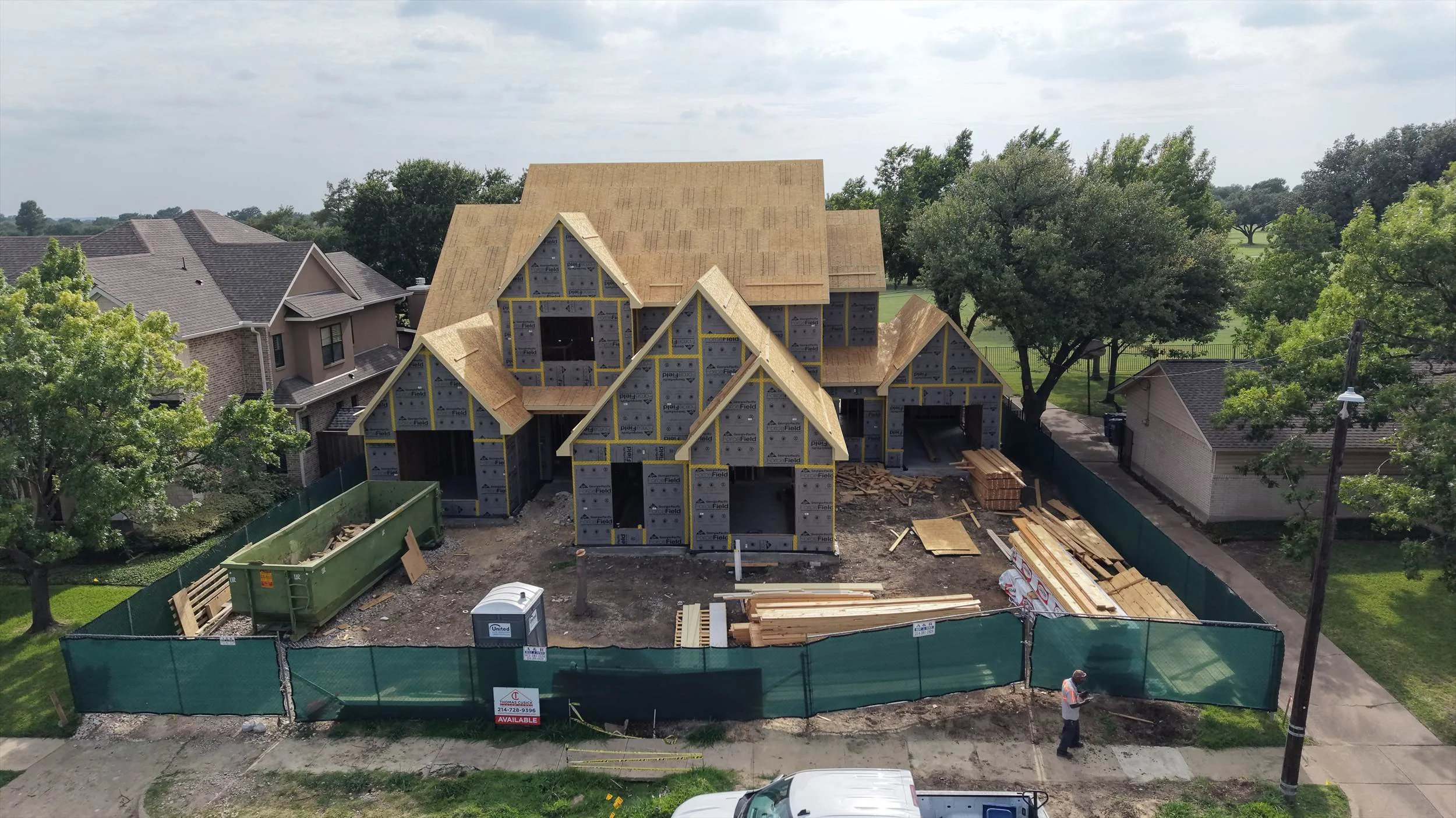 Front exterior and roof framing under construction at 14231 Coral Harbour Cir in Dallas, Texas.