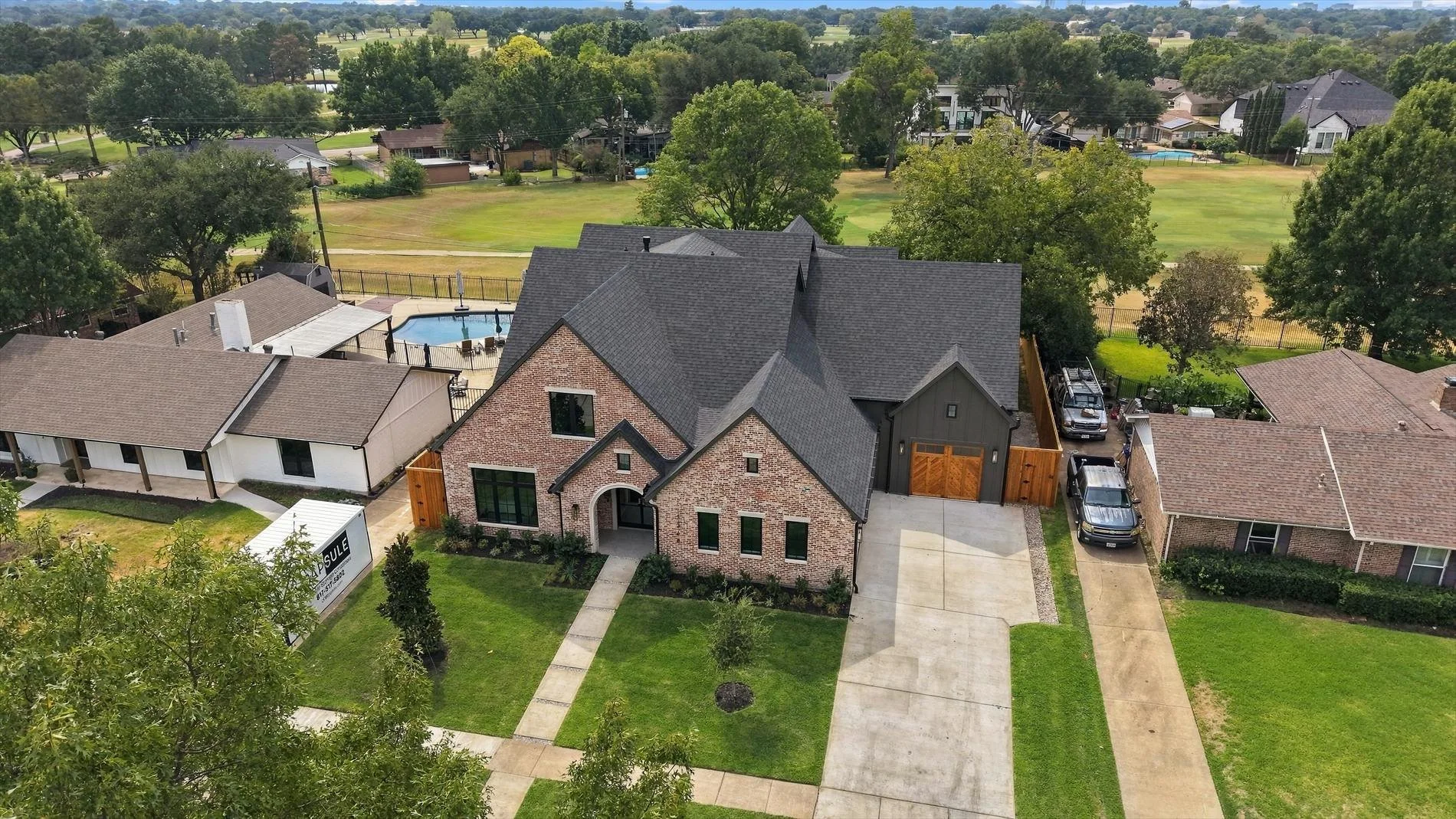 Aerial view of home and surrounding neighborhood at 3368 Dorado Beach Dr in Dallas, Texas.