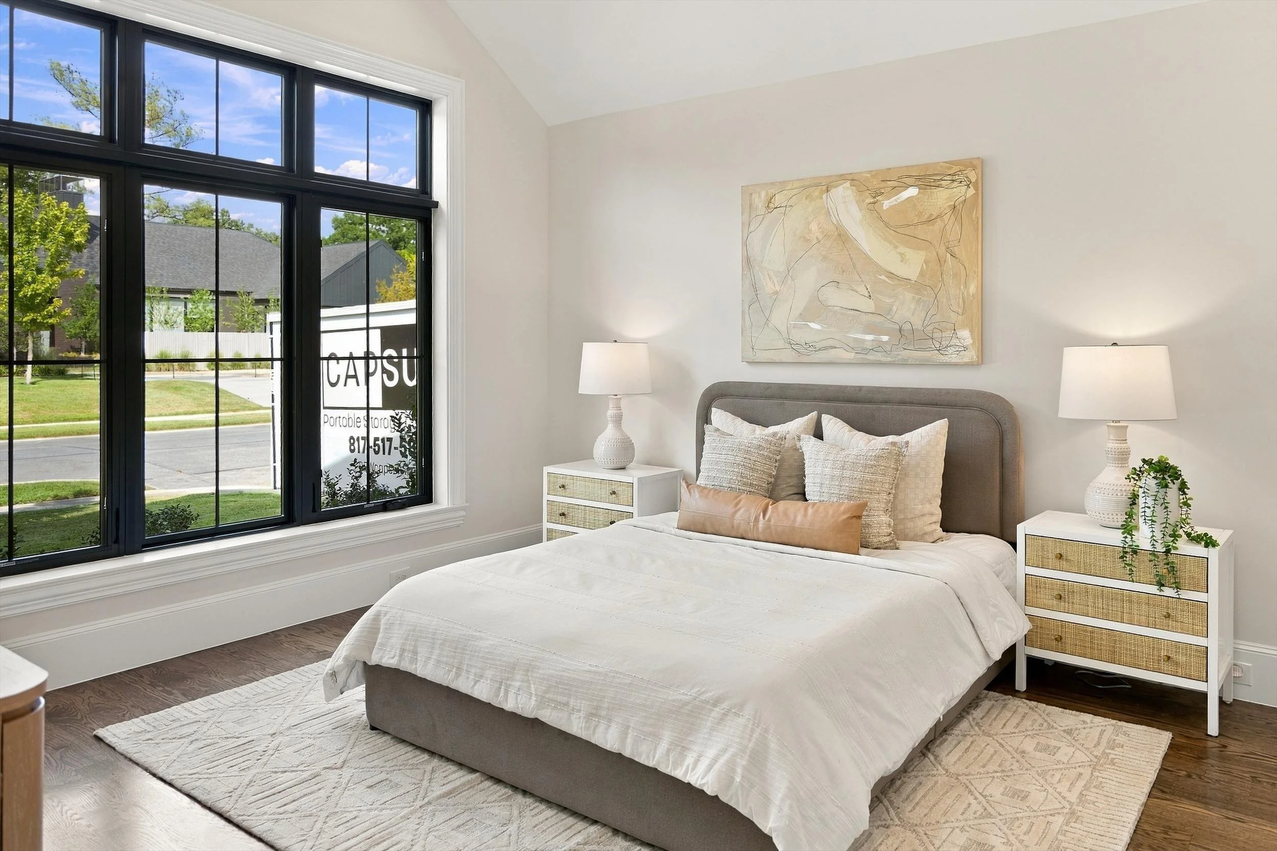 Bedroom with black-framed windows at 3368 Dorado Beach Dr in Dallas, Texas.