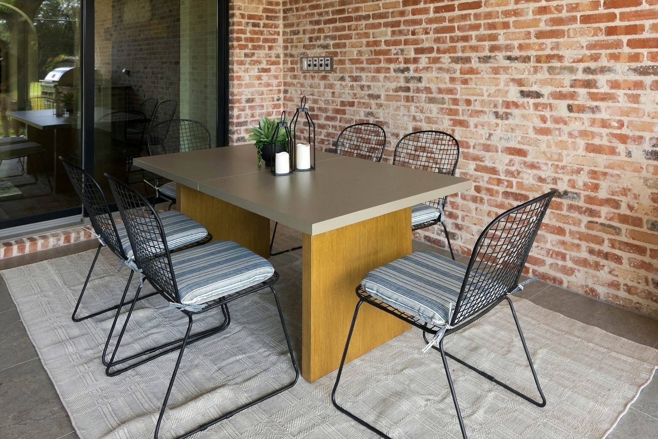 Covered patio dining area at 3368 Dorado Beach Dr in Dallas, Texas.