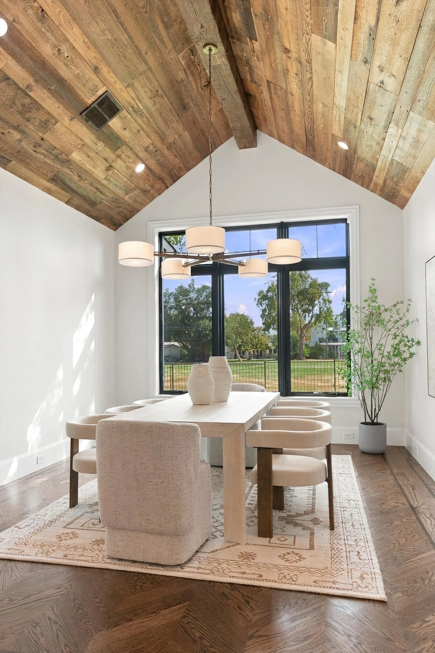 Dining room with vaulted wood ceiling at 3368 Dorado Beach Dr in Dallas, Texas.