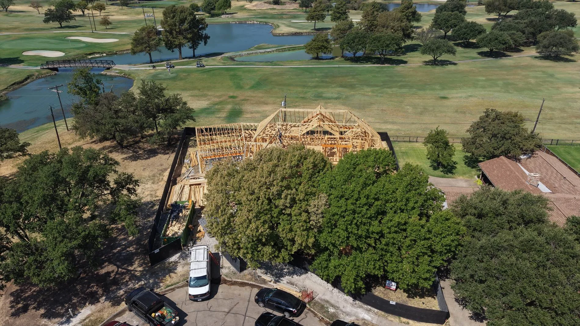 Aerial view of the home under construction at 14211 Coral Harbour Cir in Dallas, Texas.