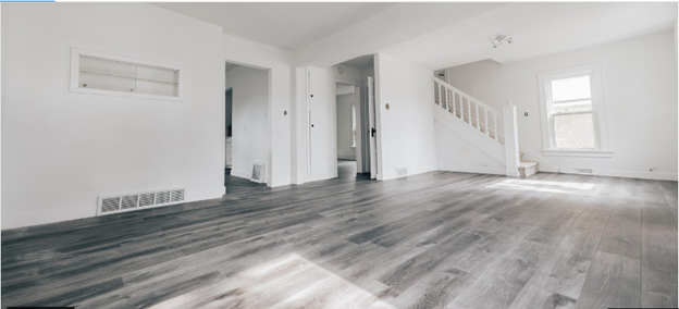 Living Room After Photo with Stairs.png