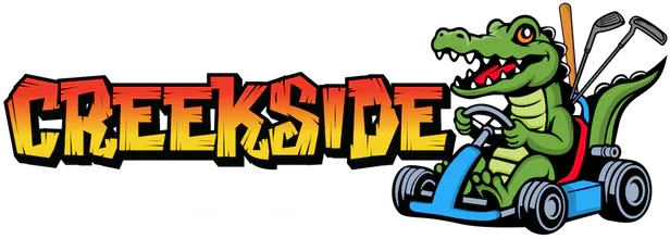 Cartoon alligator driving a go-kart with a paddle and a golf club, and the text 'CREEKSSIDE' in large red and yellow letters.
