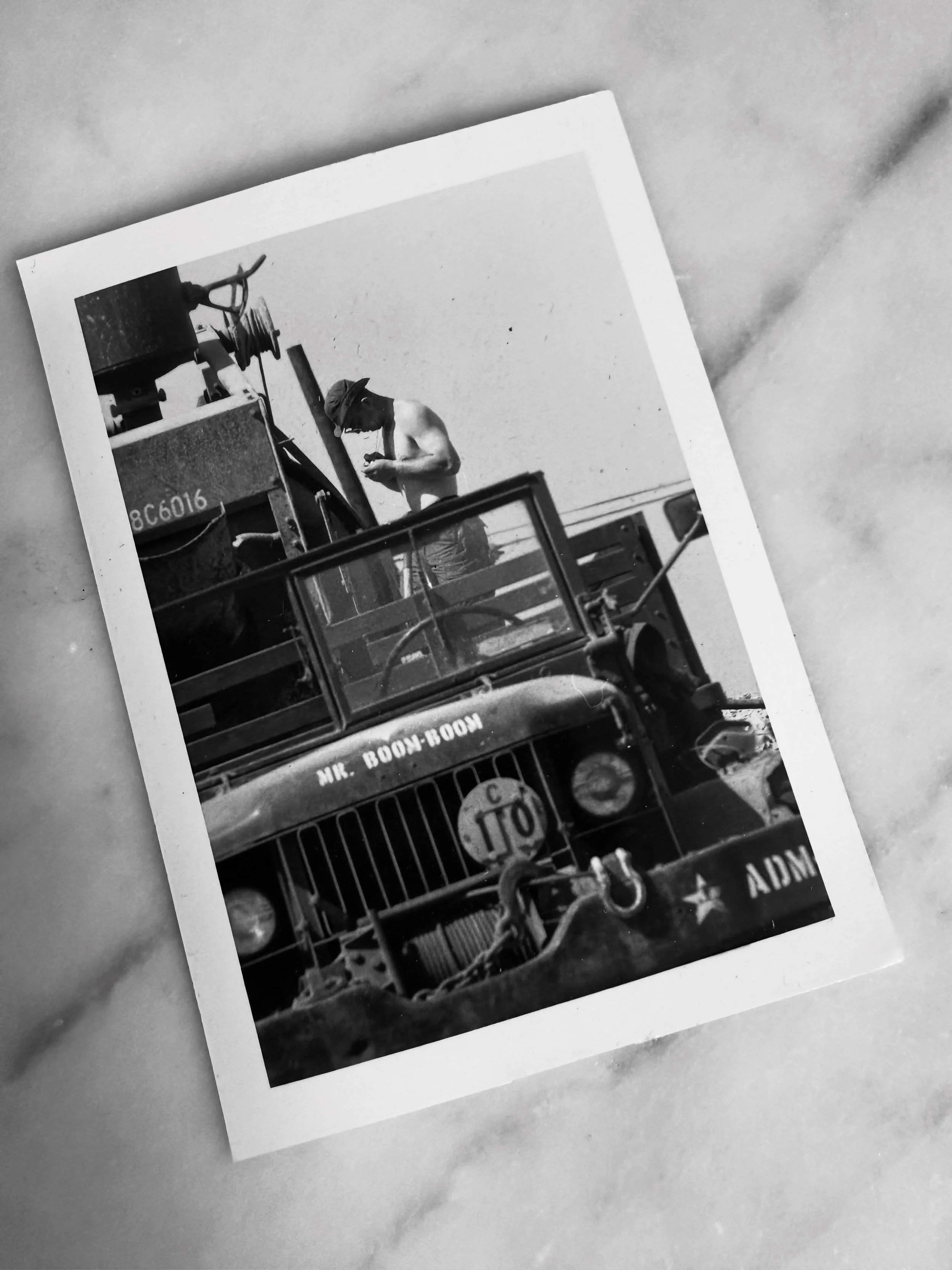 Original Vietnam War snapshot, probably early 1970s.

An American military vehicle parked alongside heavy equipment somewhere in Vietnam, with a soldier photographed mid-moment above the cab.

What caught my attention was the hand-painted &ldquo;MR. 
