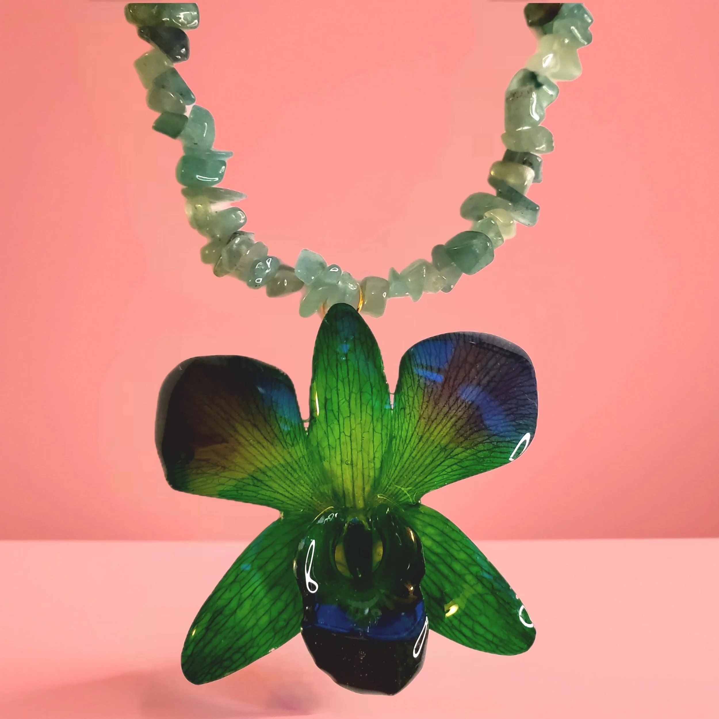 Green Orchid with stone.jpg