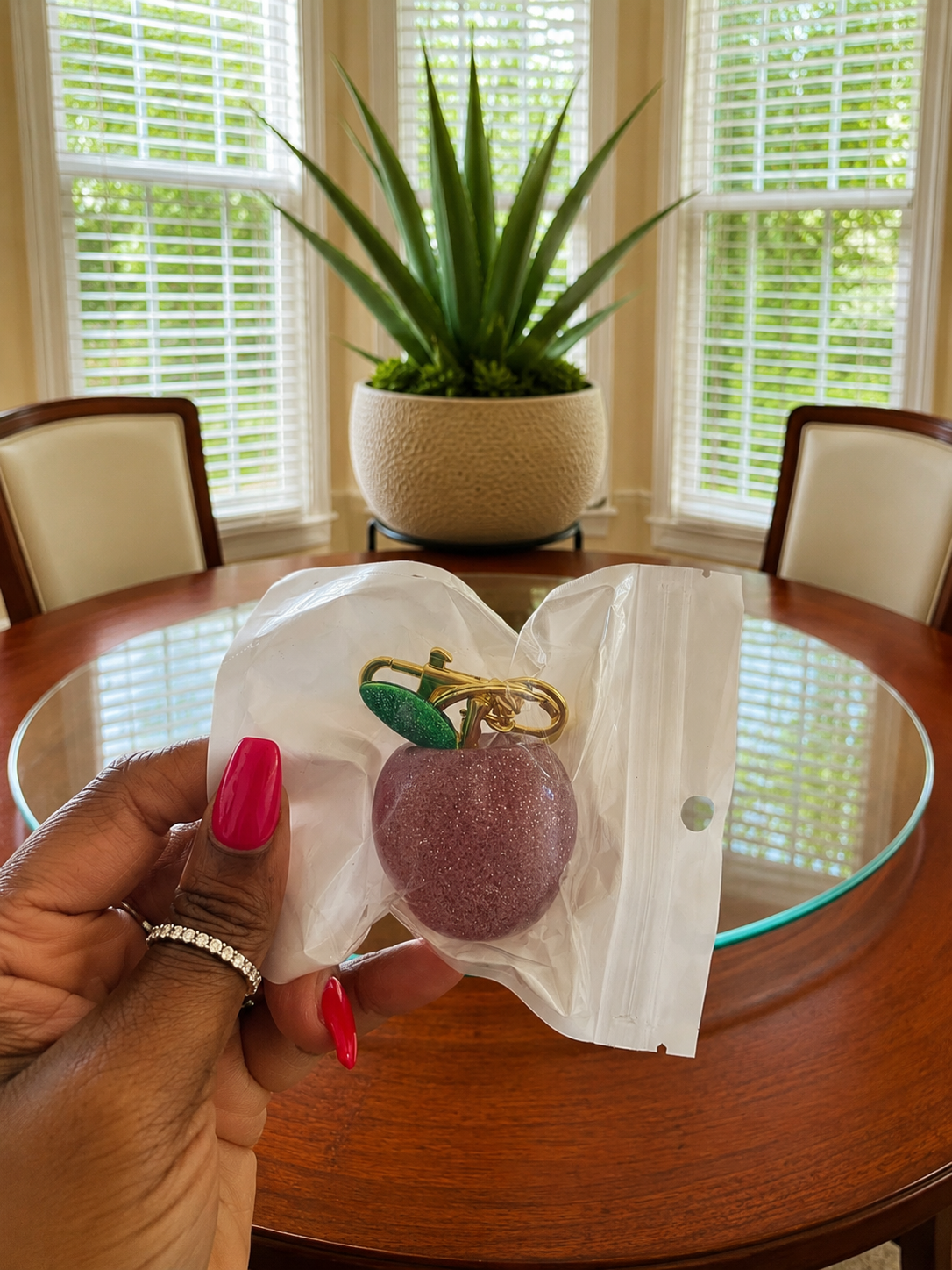 Single Pink Apple with silver glitter gold with green leaf.PNG