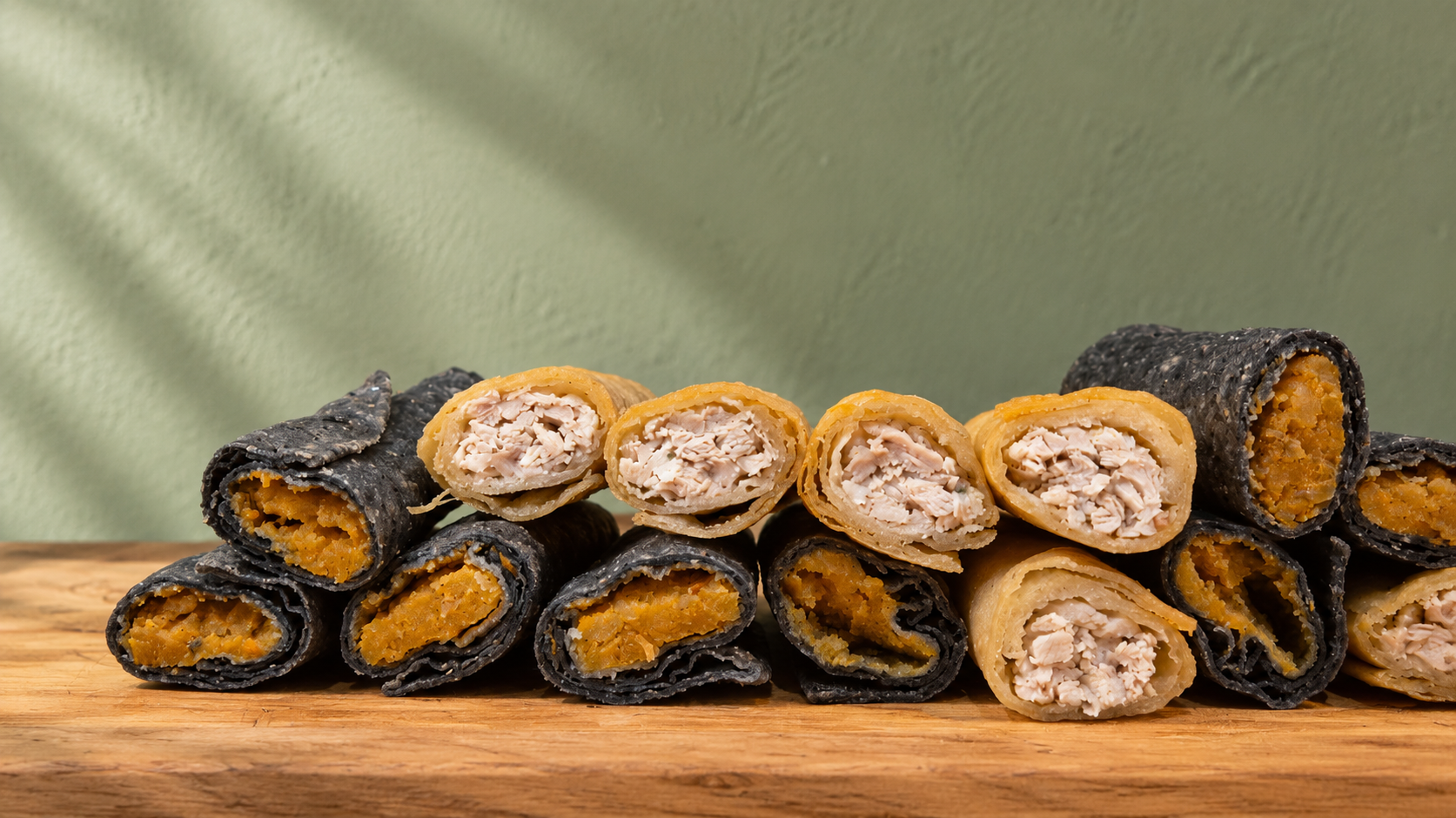 Chicken and Potato flautas cut by halk