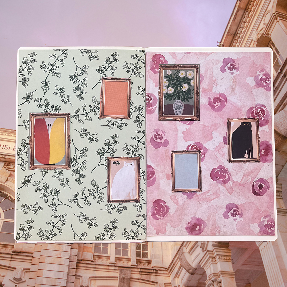 an open journal with decorative paper on both pages and small cutout frames with pictures in each frame on both pages