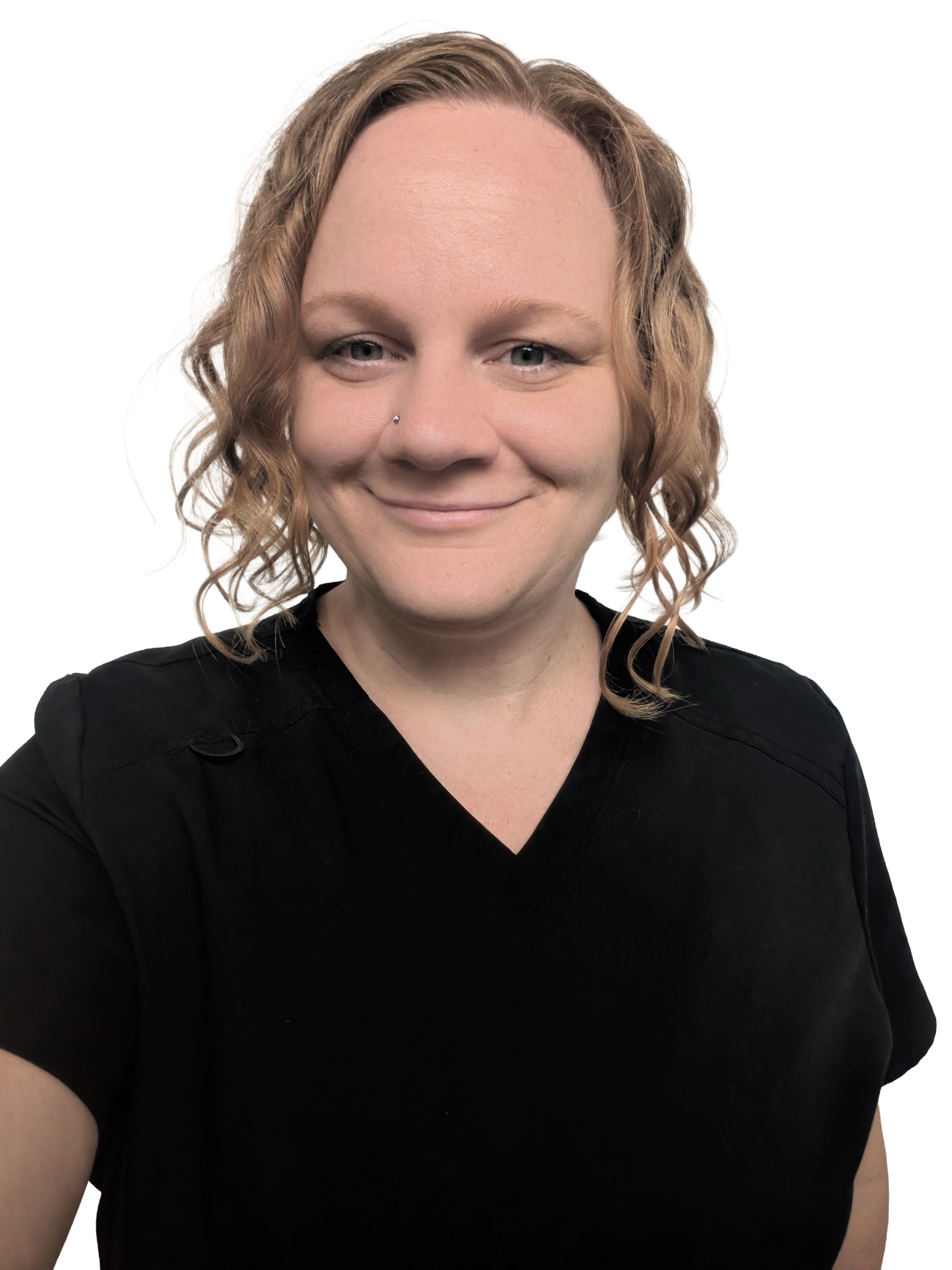 A close-up of a woman with curly blonde hair, wearing a black shirt, smiling, with a nose piercing and light makeup.