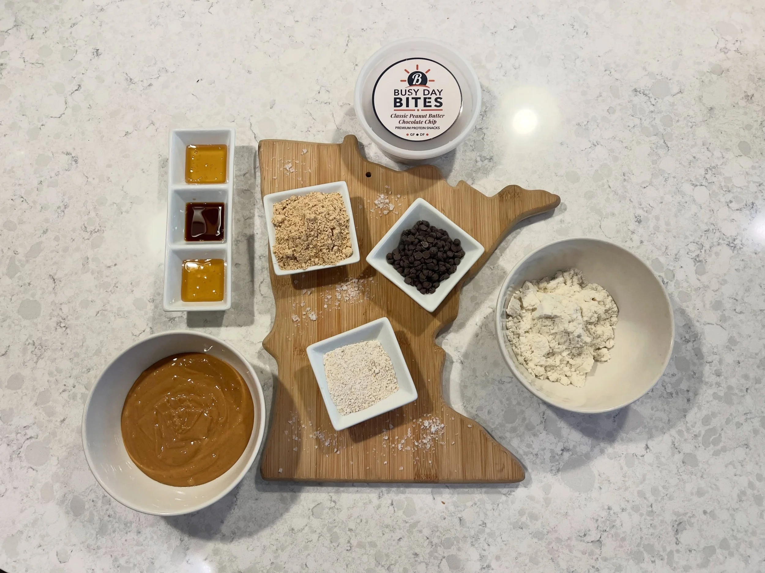 The goal was never to create the lowest-calorie snack or the highest protein snack.

The goal was balance.

Every ingredient has a purpose.

🥜 Organic Peanut Butter and Peanut Powder
🍯 Local Honey
💪 Premium Protein
🌾 Gluten-Free Oats
🍫 Dairy-Fre