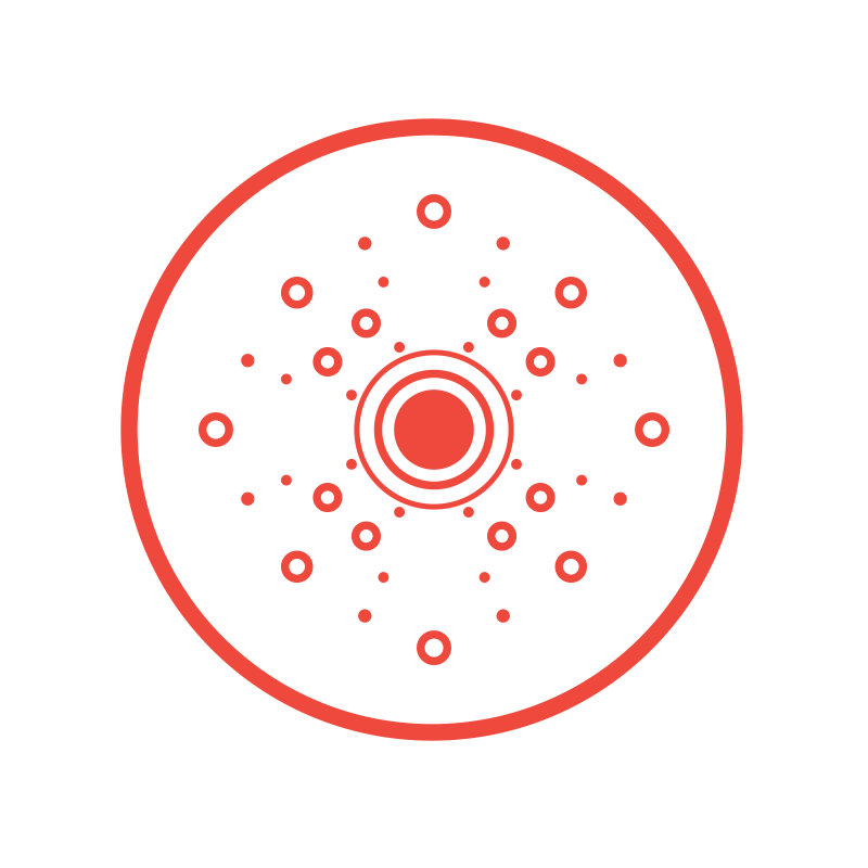 A red and black illustration of a circular object with various smaller circles and dots arranged symmetrically around a center, resembling a geometric or scientific diagram.