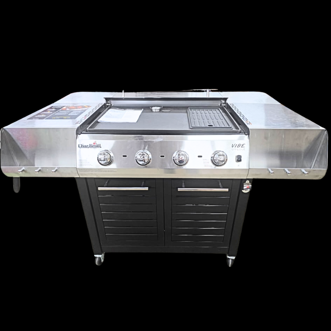Commercial stainless steel gas grill with black storage cabinet and four control knobs, isolated on black background. - AA Wholesale | Amory | MS | Wholesale | Deals | Amory Auction