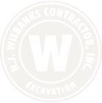 Logo of W. Wilbanks Contractor Inc. specializing in excavation.