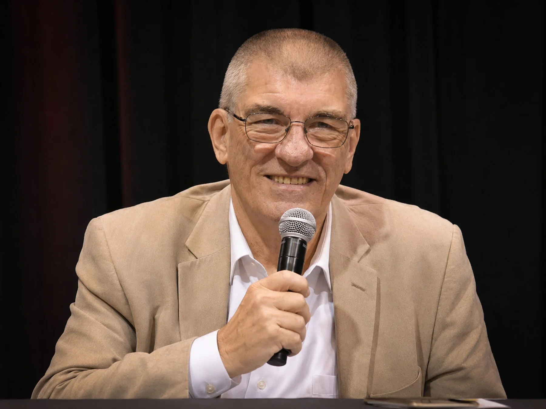 Jim Shooter speaks during a panel discussion at Showcase Comic Con in Slidell, Louisiana. The longtime Marvel Editor-in-Chief and Valiant founder shared stories from a career that helped shape modern comics.