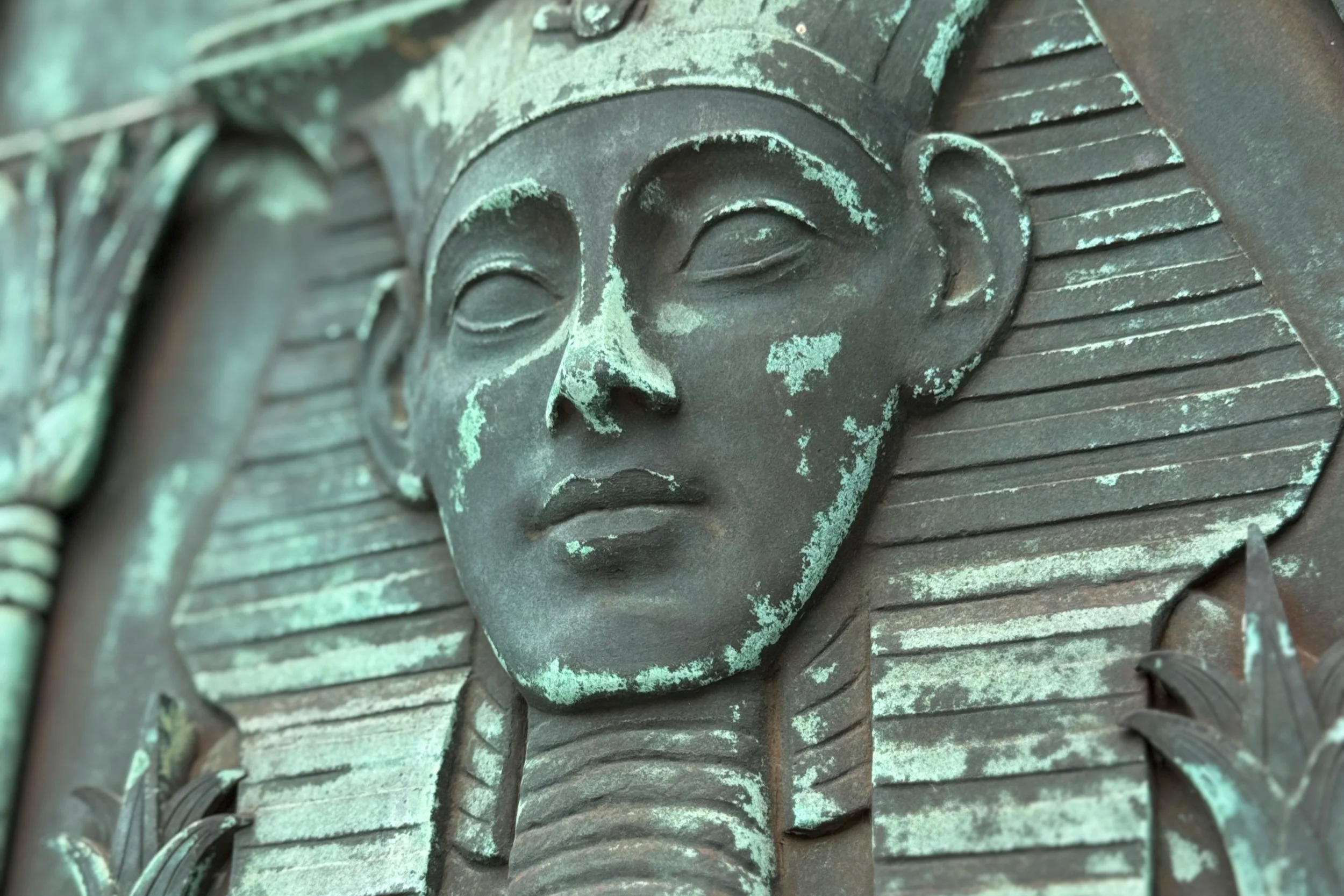 williams-tomb-egyptian-face-detail-metairie-cemetery.png