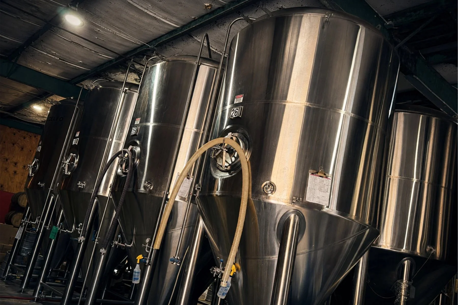 Rows of stainless-steel brewing tanks inside Gnarly Barley Brewing in Hammond.