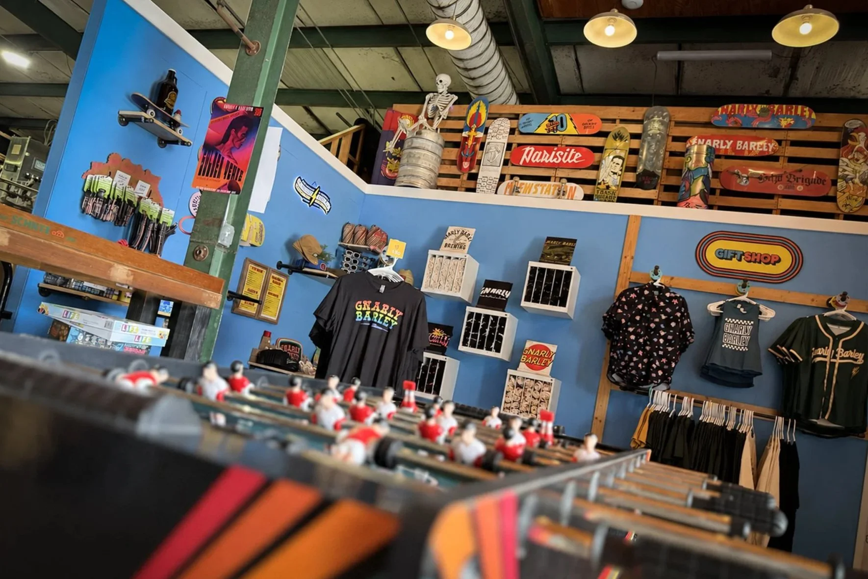 Foosball table overlooking the merchandise area inside the Gnarly Barley brewery and taproom in Hammond, Louisiana.