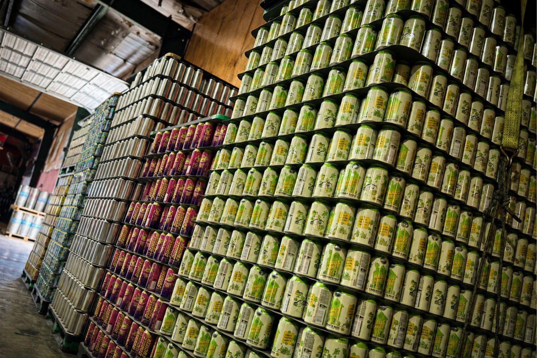 Tall stacks of Gnarly Barley cans awaiting production inside the Hammond brewery.