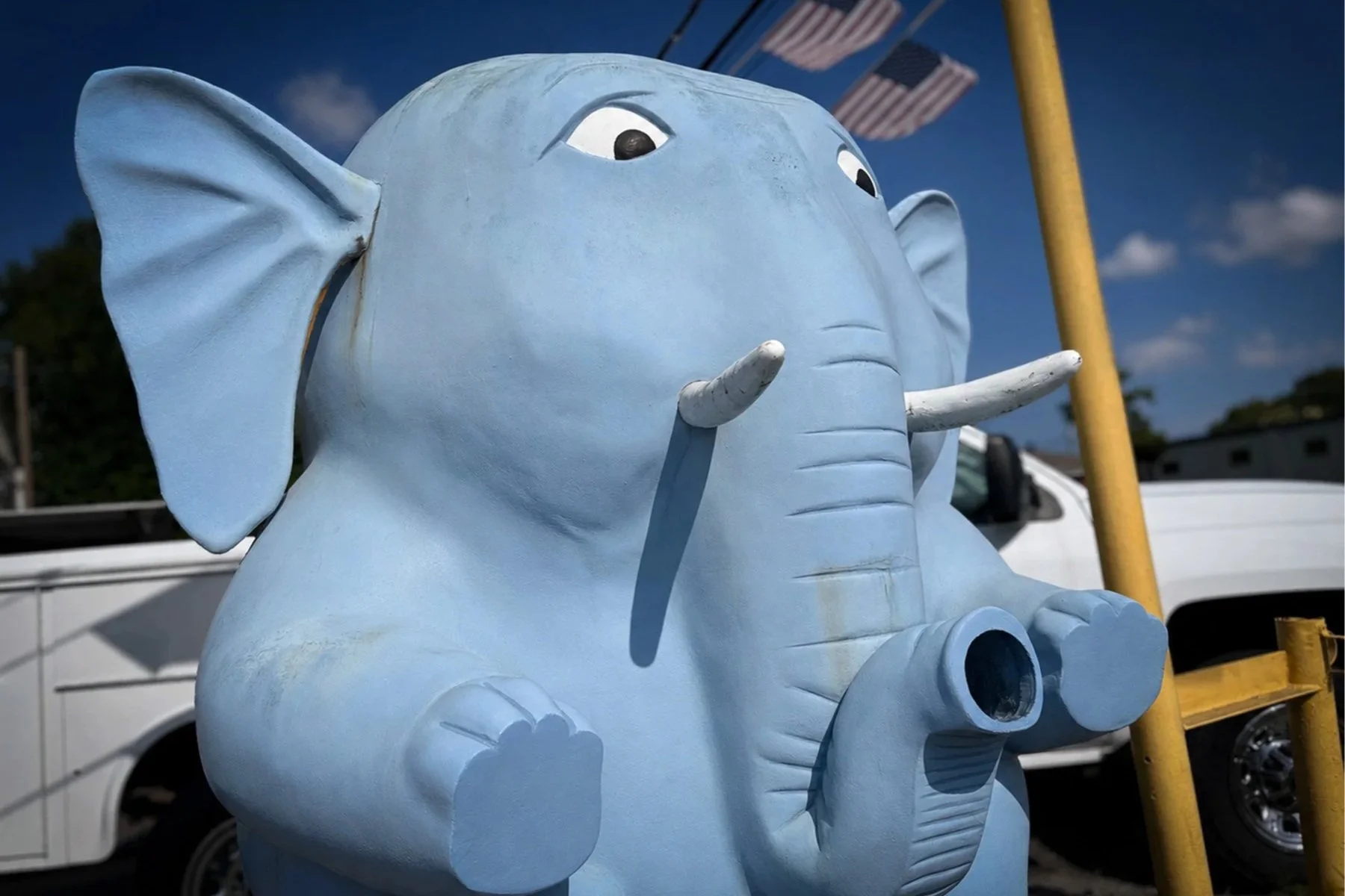 Harry Batt's blue elephant paper eater from Pontchartrain Beach, a whimsical elephant-shaped trash receptacle preserved along North Causeway Boulevard in Metairie, Louisiana.