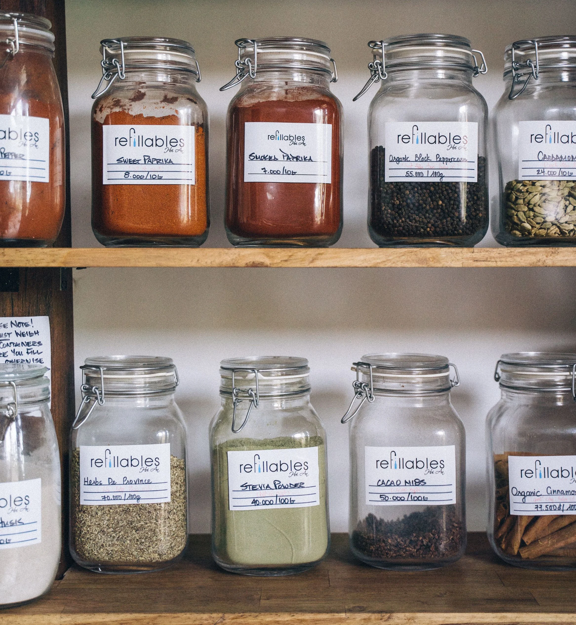 Matching spice jars to store spices in an organized pantry.