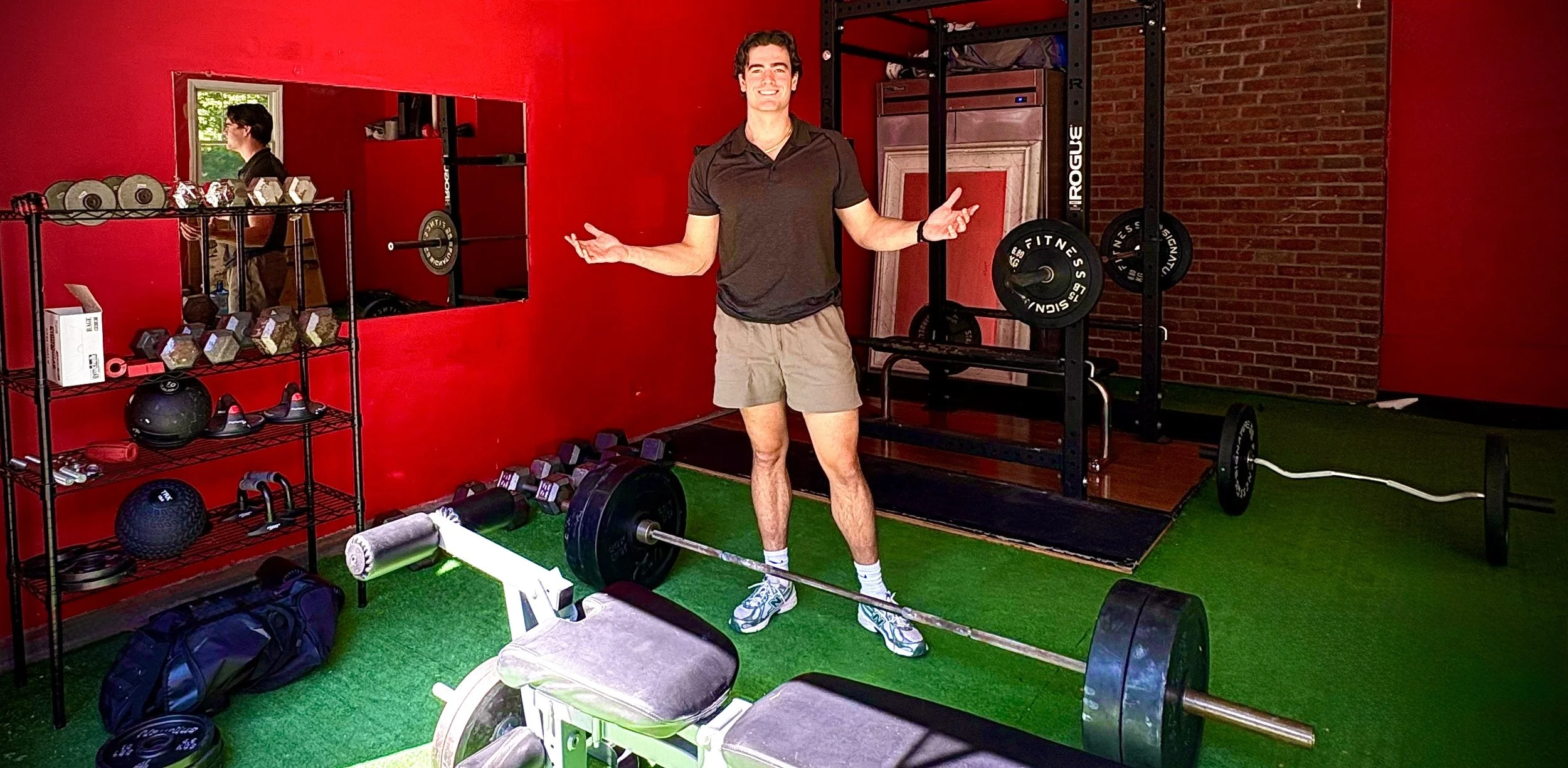 Billy Vetter standing in his private Long Island training gym.