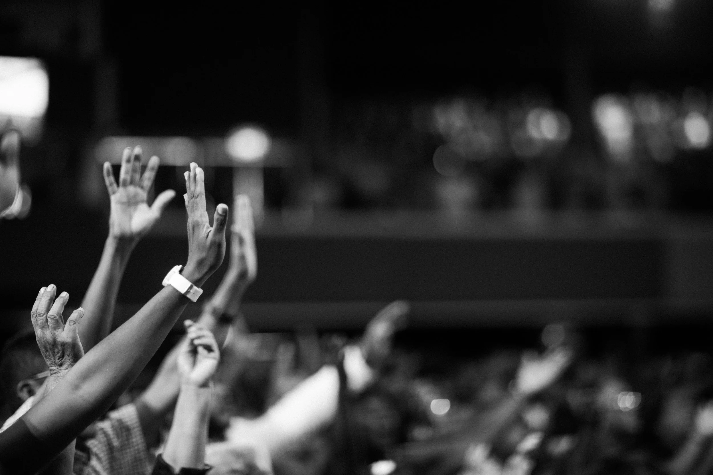 Luis Quintero created image of hands lifted during worship.