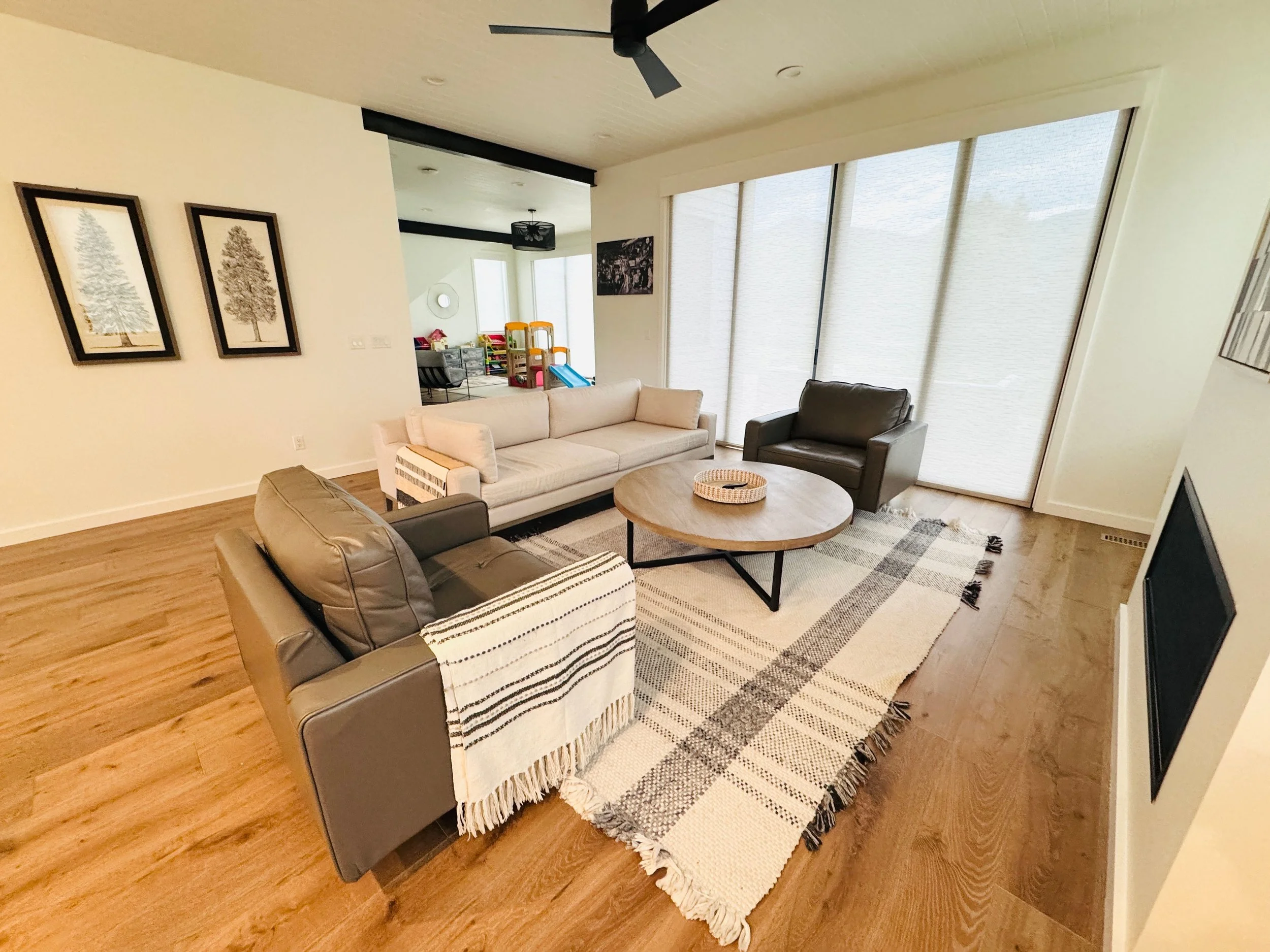 Welcoming family room organization reset and staging to prepare a cozy Park City, Utah living space for returning family members.