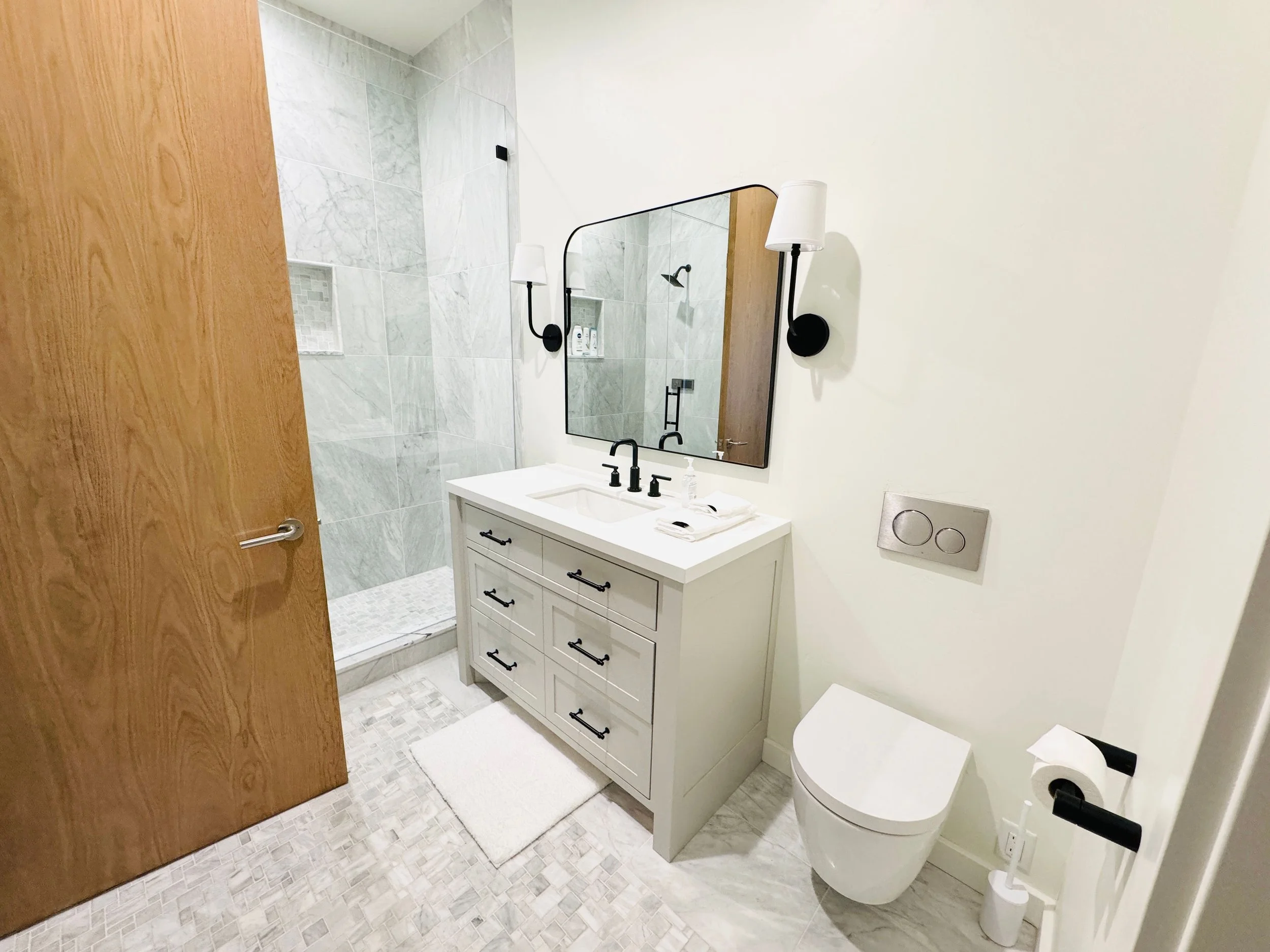 Professional Airbnb guest bathroom reset, deep turnover organization, and fresh linen styling for a luxury vacation rental in Park City, Utah.