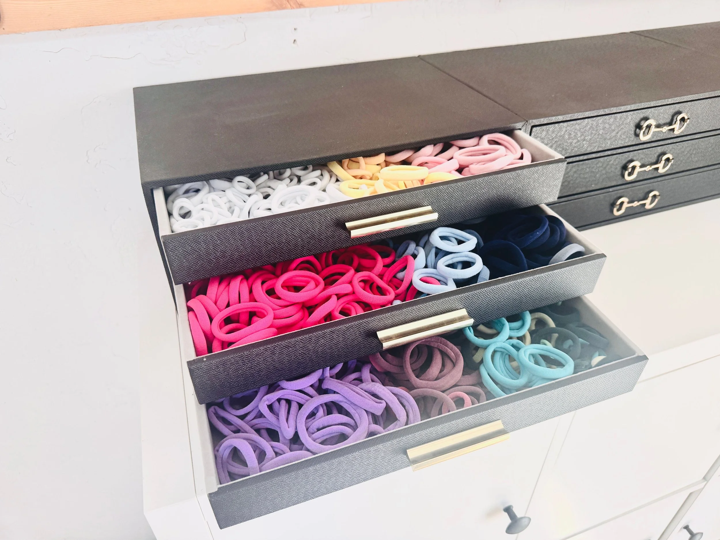 Neat vanity drawer organization for hair ties and hair accessories in Park City, Utah.