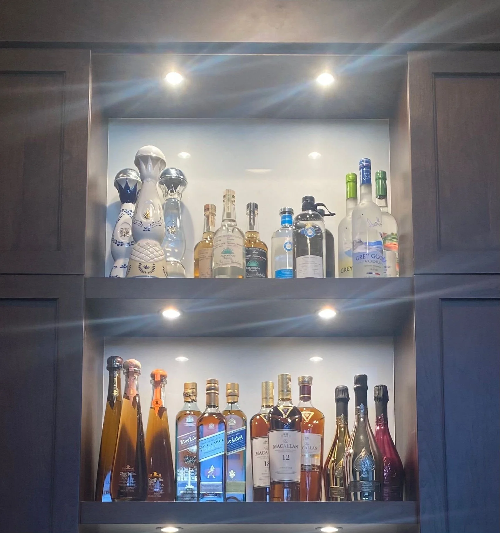 Customized wine storage and alcohol cabinet organization by a professional organizer in Park City, Utah.