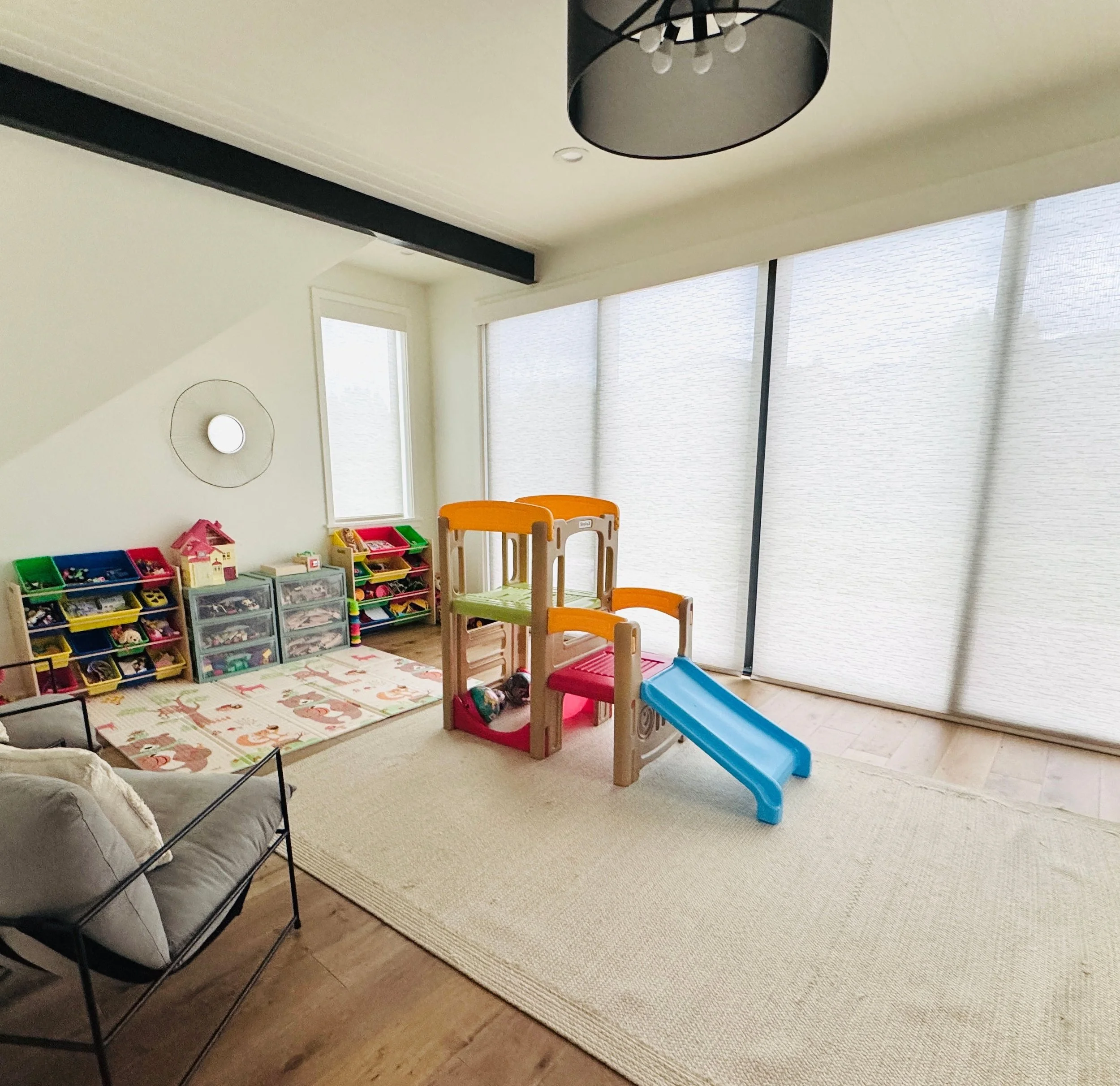 Streamlined playroom organization featuring clear bins and easily accessible toy storage systems in Park City, Utah.