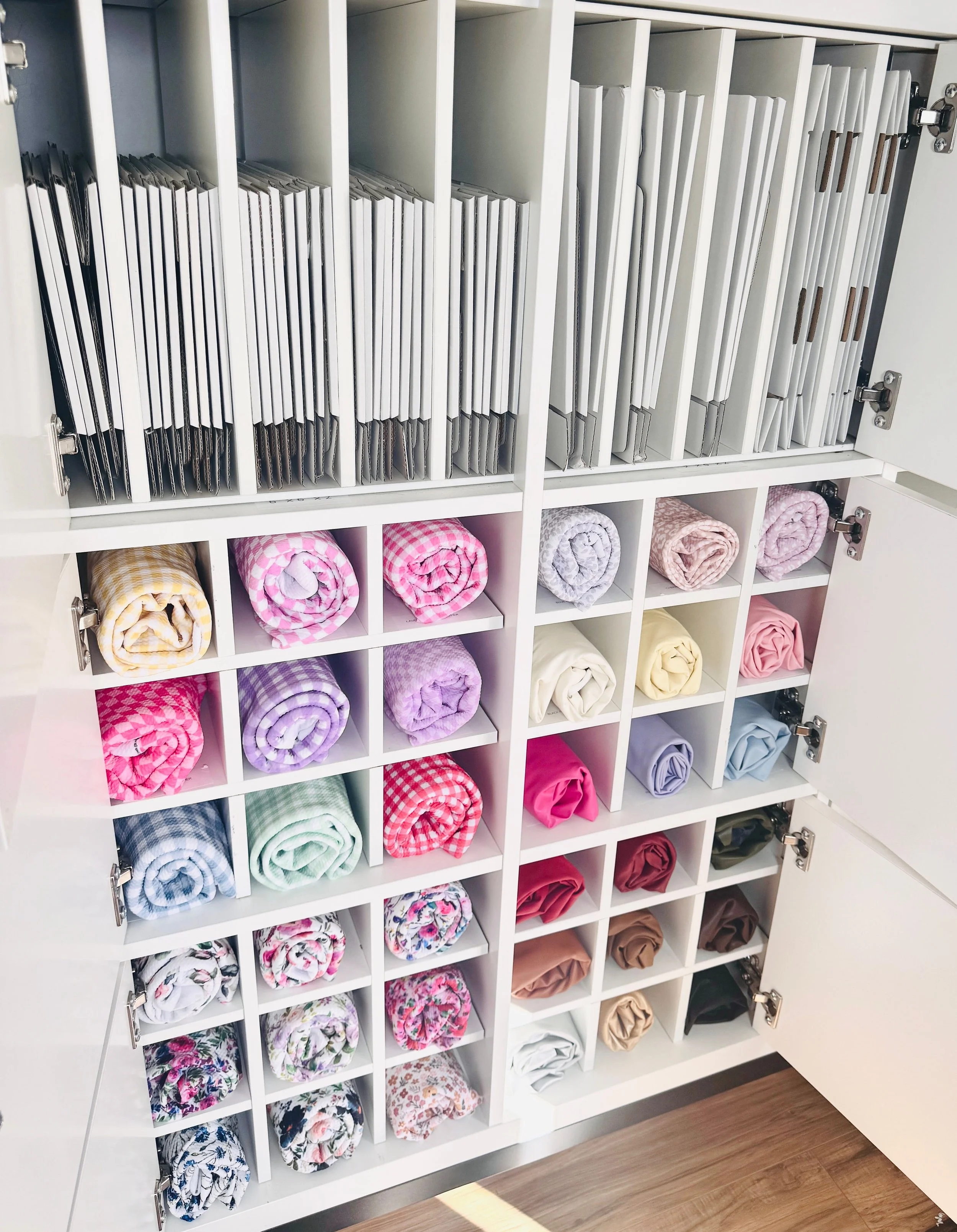 Efficient shipping station and fabric storage organization for a Park City Etsy shop.