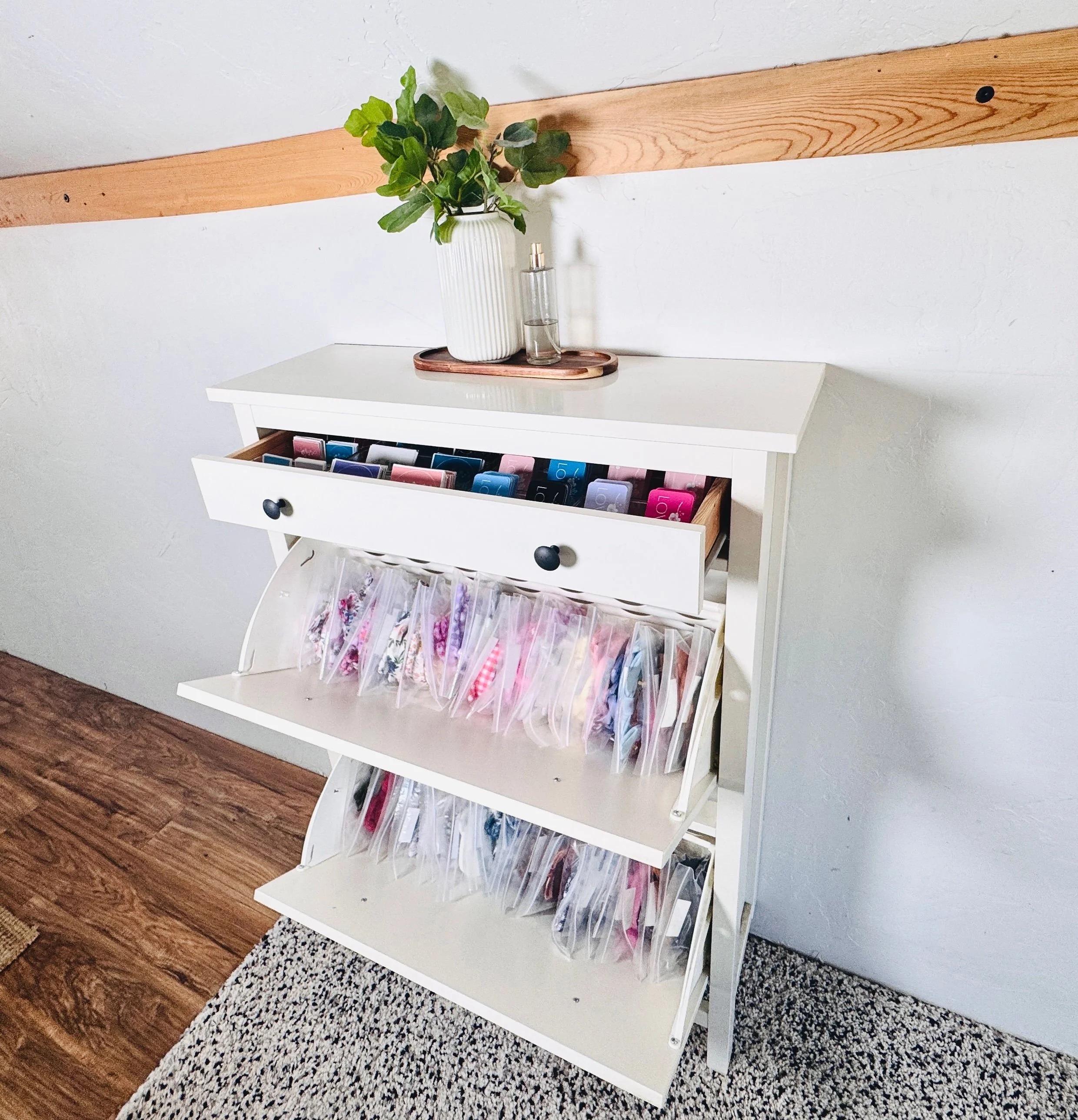 Organized workspace and product inventory storage for a Park City Etsy business.