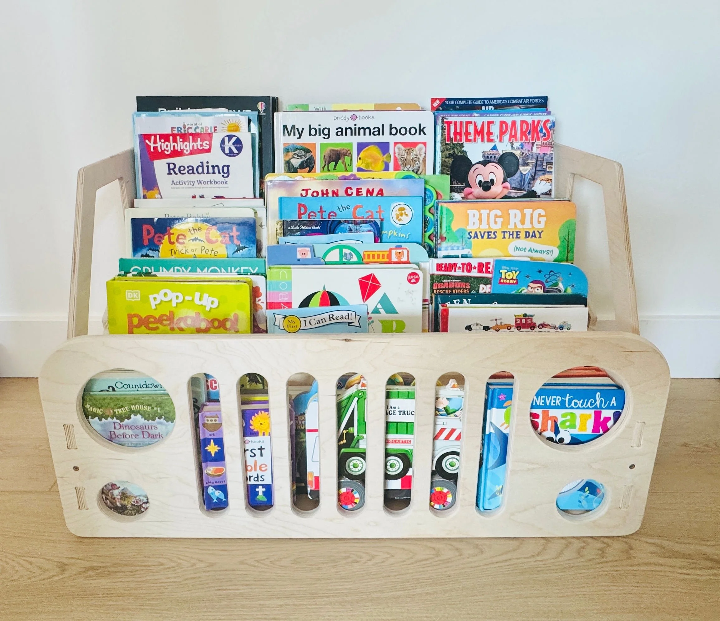 Organized boys' reading nook featuring streamlined book and magazine storage in Park City.