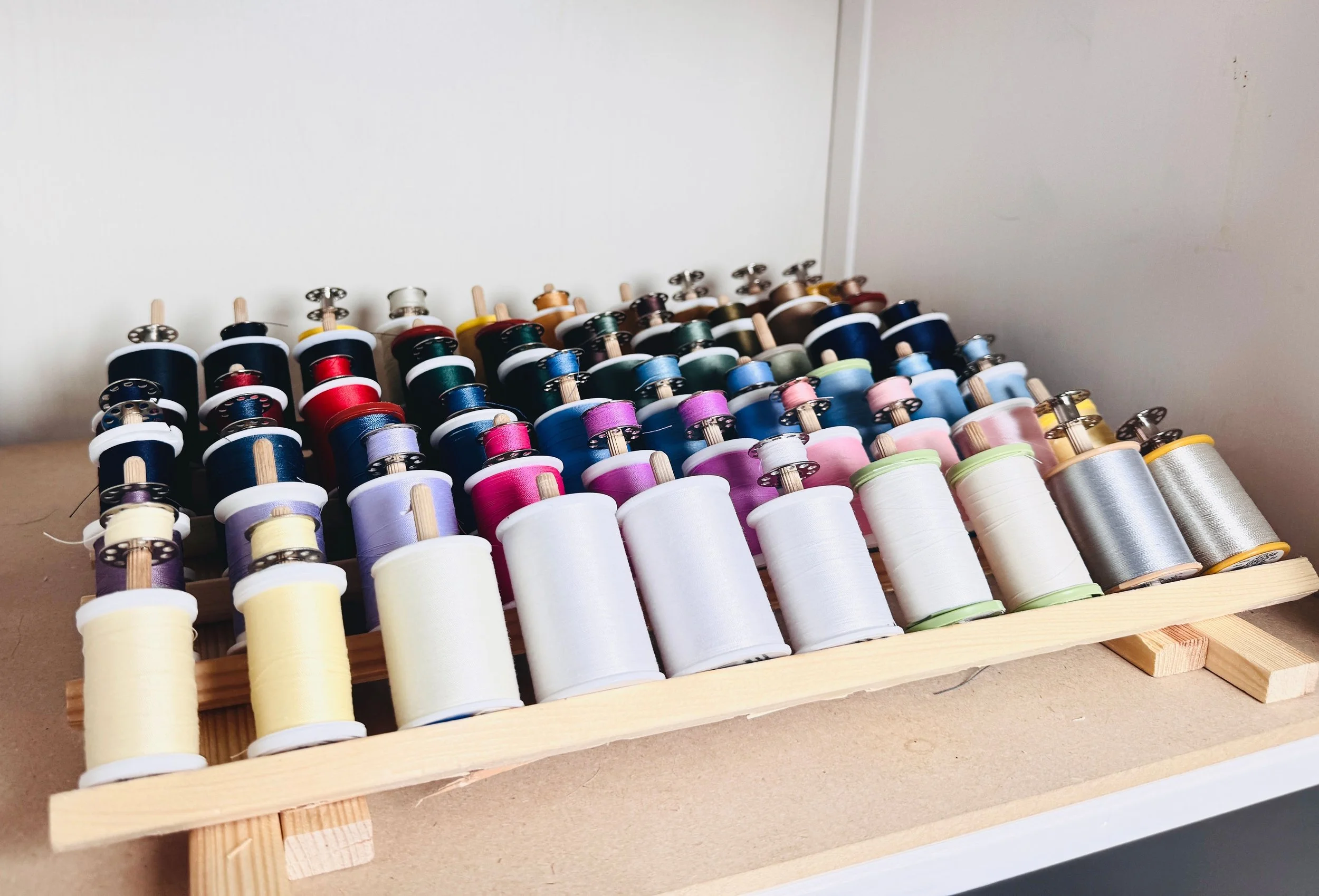 Color-coded craft thread organization system in Park City, Utah.