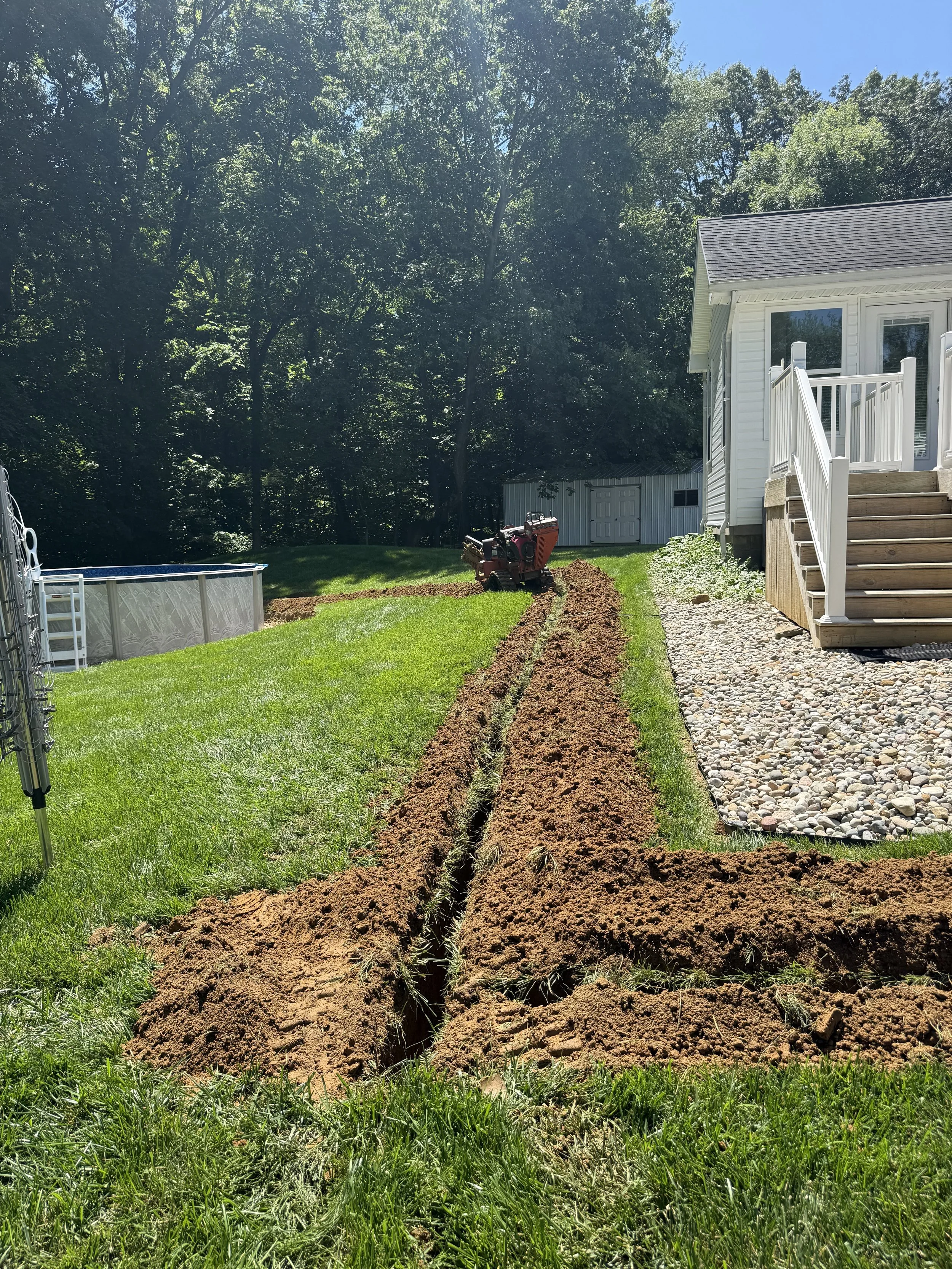 Underground electrical conduit installation, secondary line trenching, and outdoor power routing by ProVolt Electric in Odon, Indiana.