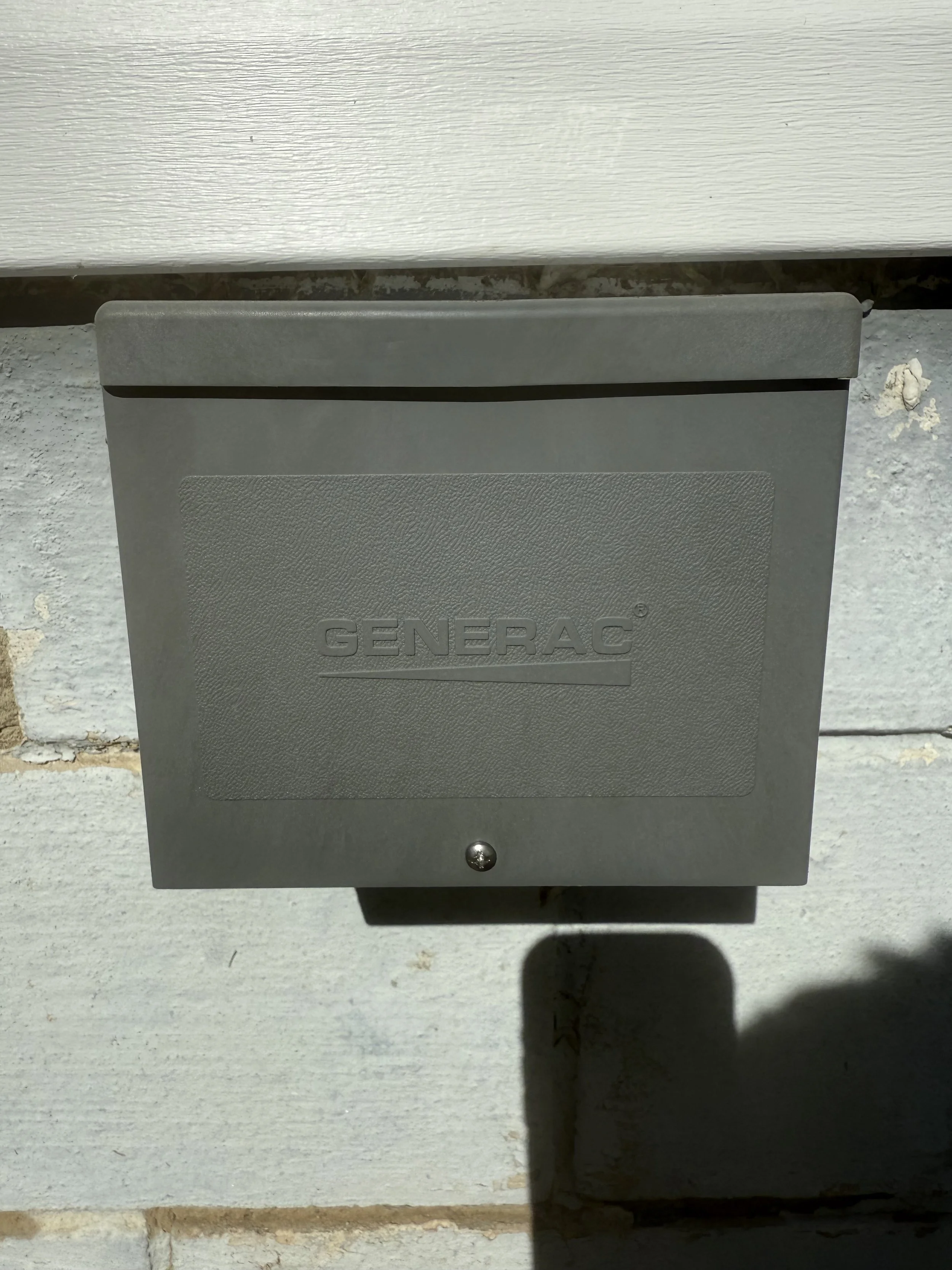 50 amp Generac generator inlet box and home backup power emergency interlock switch installation by ProVolt Electric in Springville, Indiana.