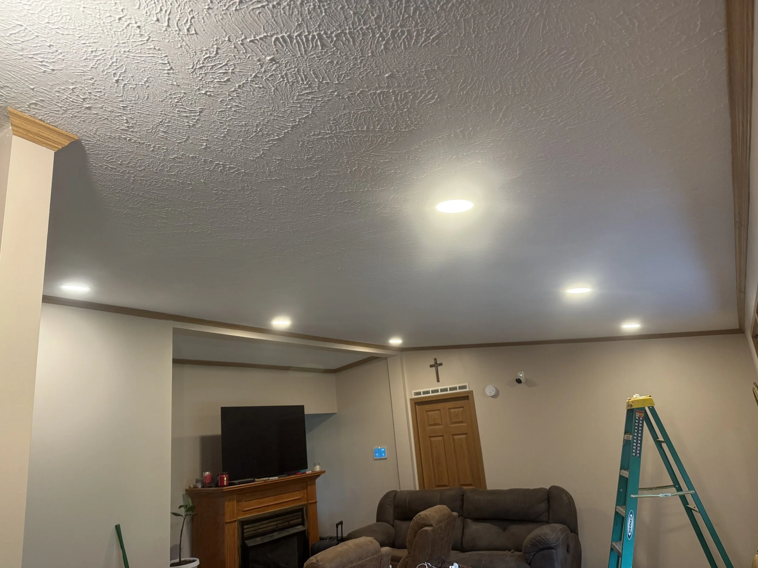Residential custom indoor lighting installation, recessed LED upgrades, and dimmer switch setups by ProVolt Electric in Bloomington, IN.