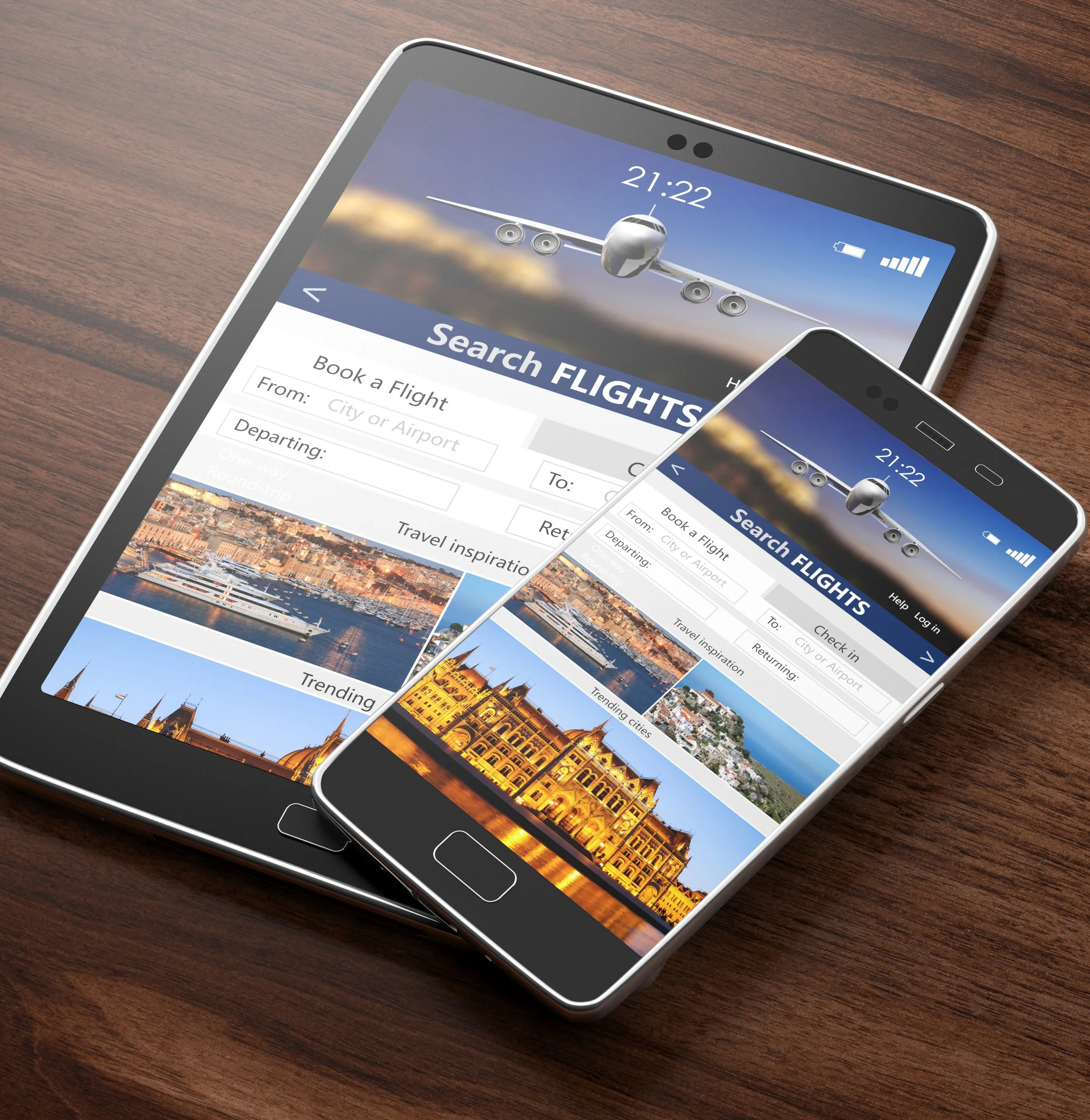 Smartphone with a flight booking website open, showing an airplane in flight and cityscape images at the bottom, placed on a wooden surface.