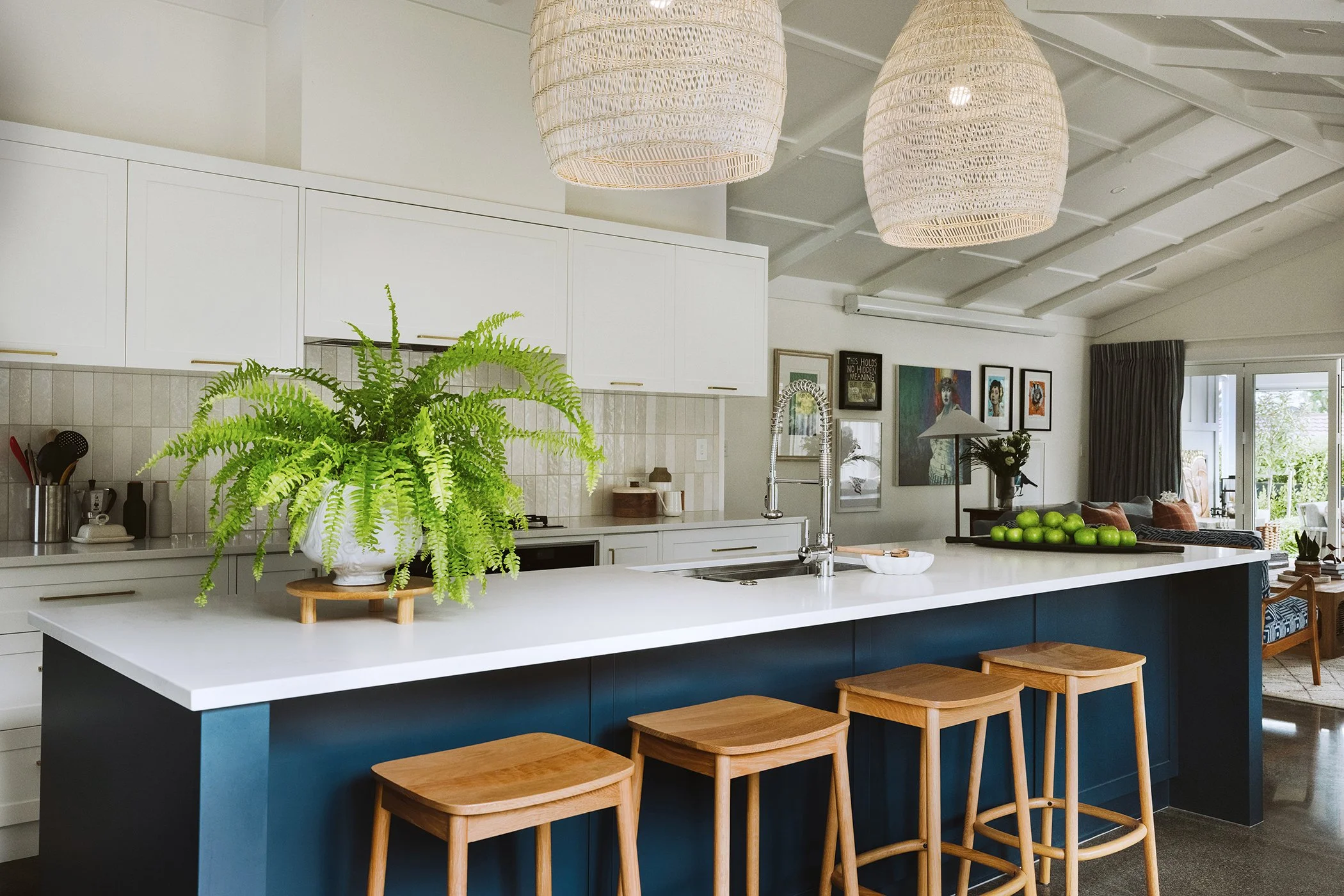 Modern residential interior design featuring open plan kitchen and living room