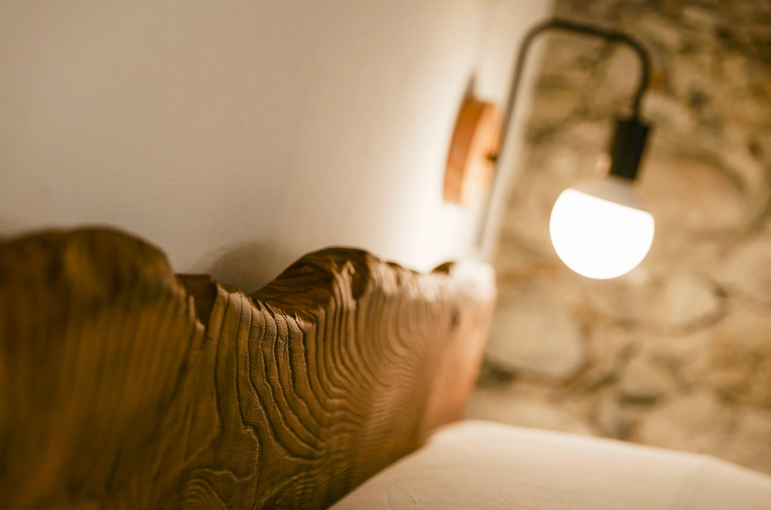 Historic architectural details at Palazzo Giani, showcasing handcrafted woodwork and the timeless character of this restored residence in Chiavenna.